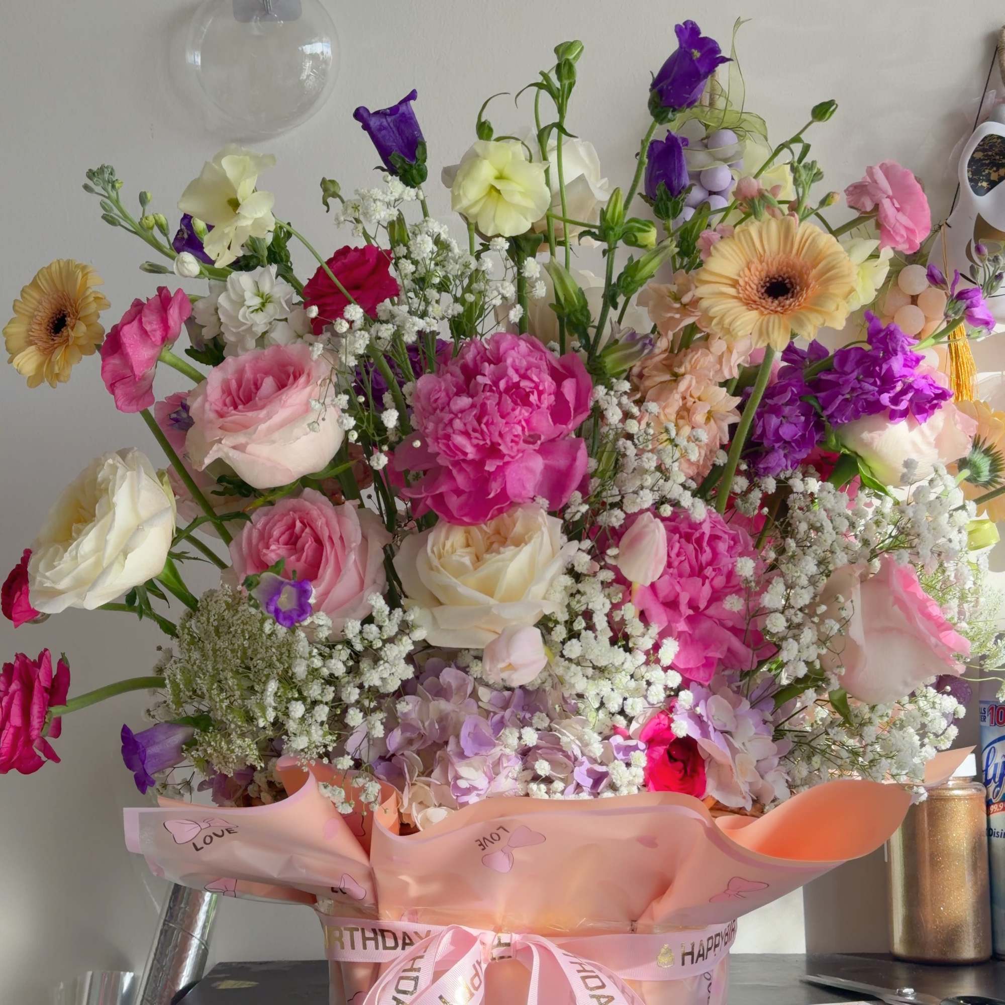 This elegant double-sided floral basket arrangement is designed to be admired from, photo 2 of 5
