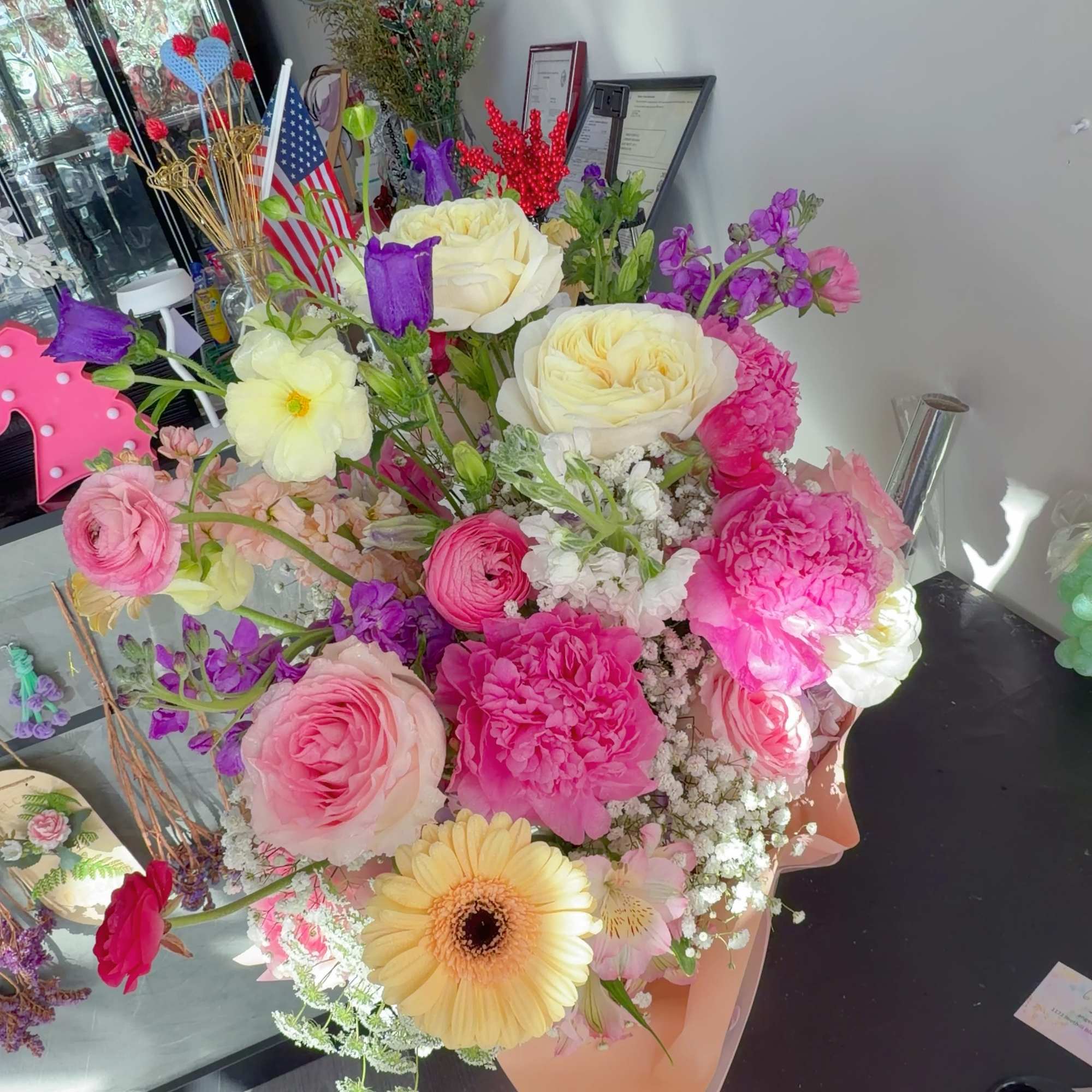 This elegant double-sided floral basket arrangement is designed to be admired from, photo 4 of 5