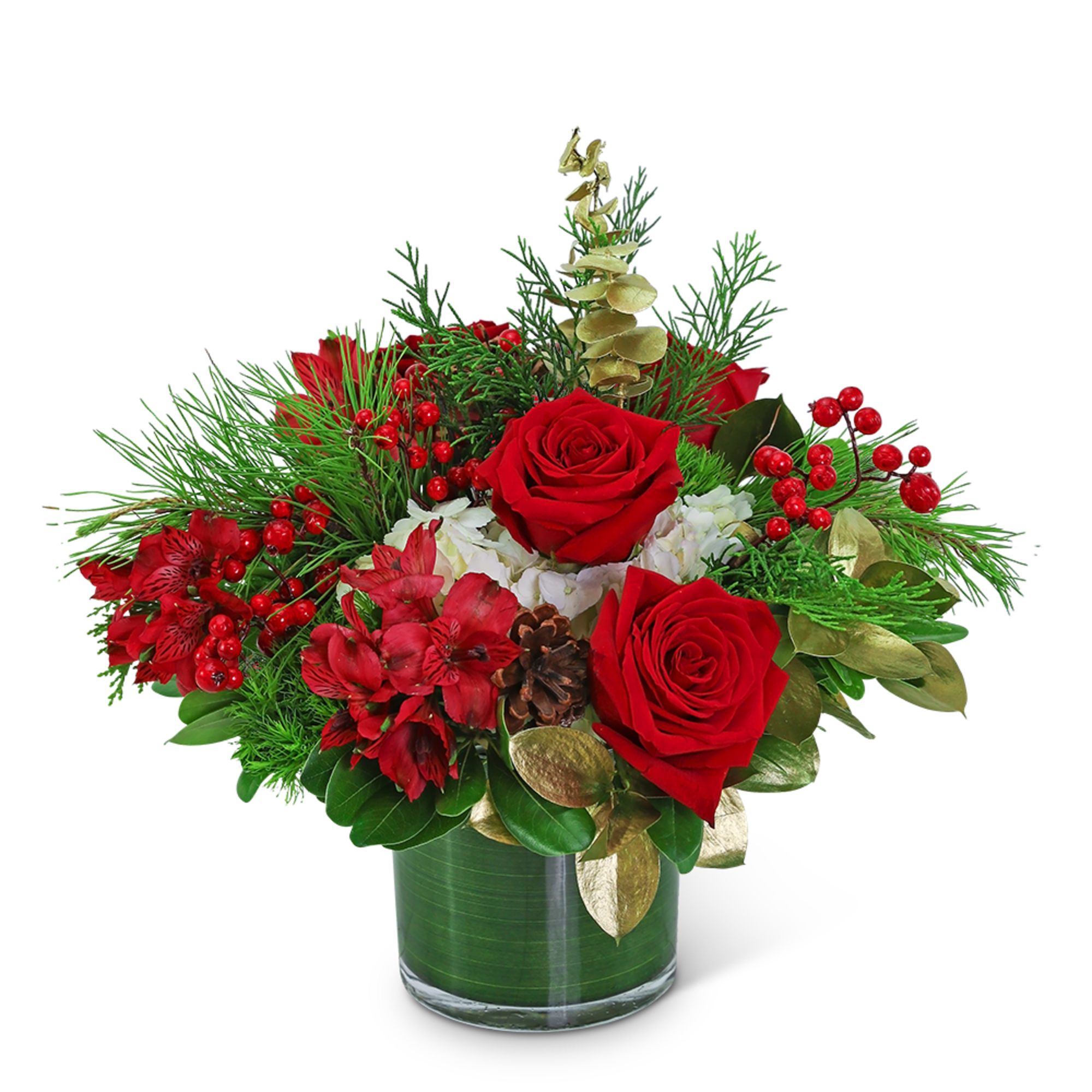 Red roses and red flowers in a glass vase with pine and berries