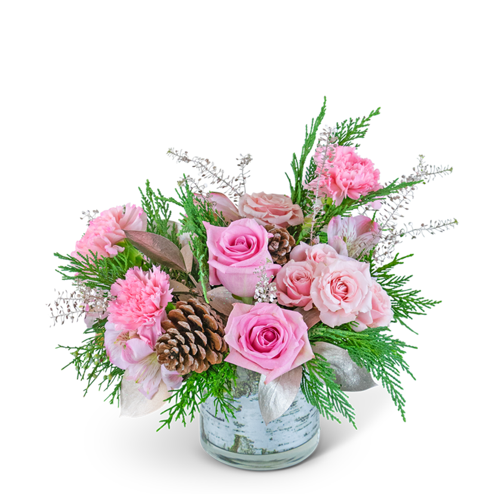 Pink roses and carnations in a glass vase with pinecones