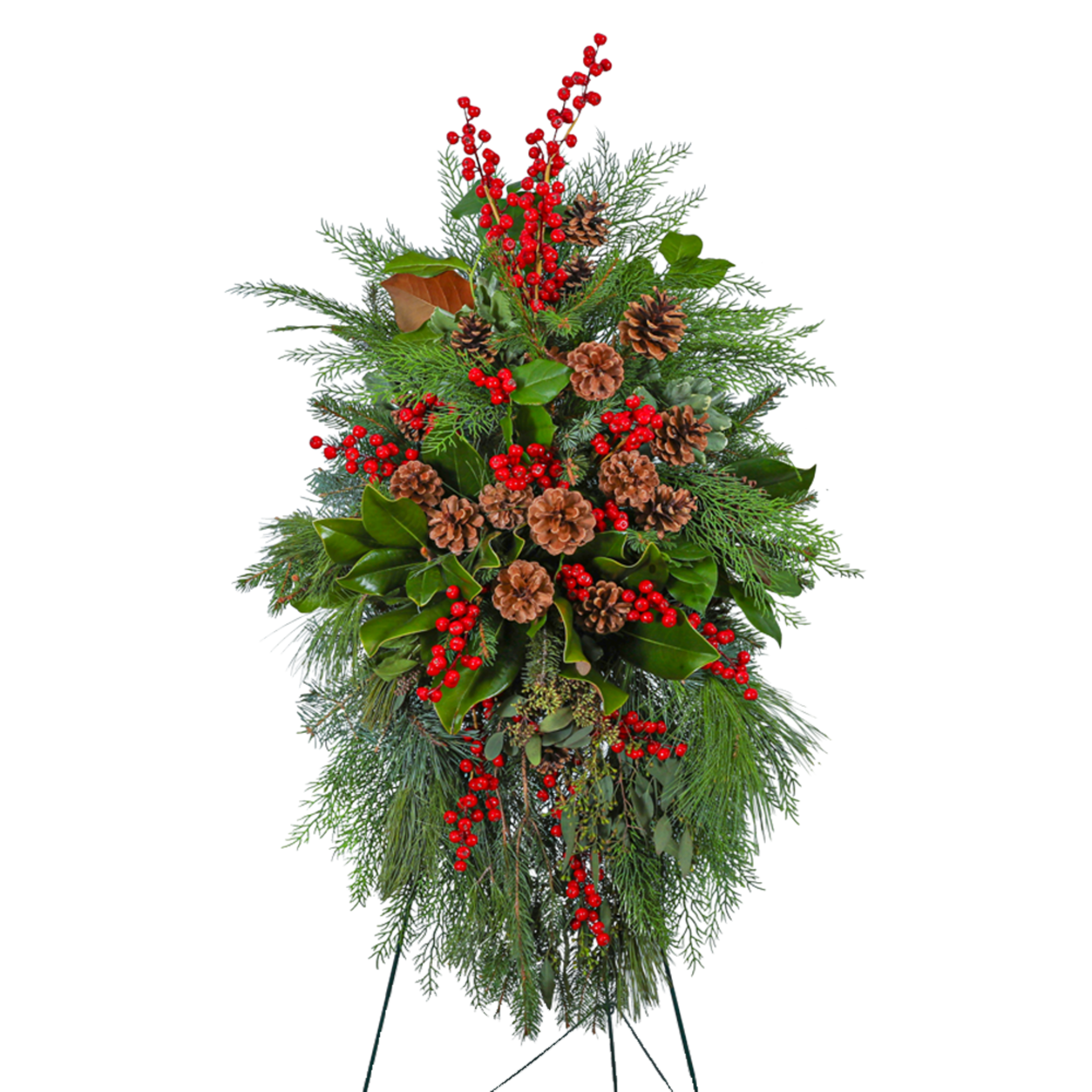 Holiday standing spray with red berries, pinecones, and evergreen foliage
