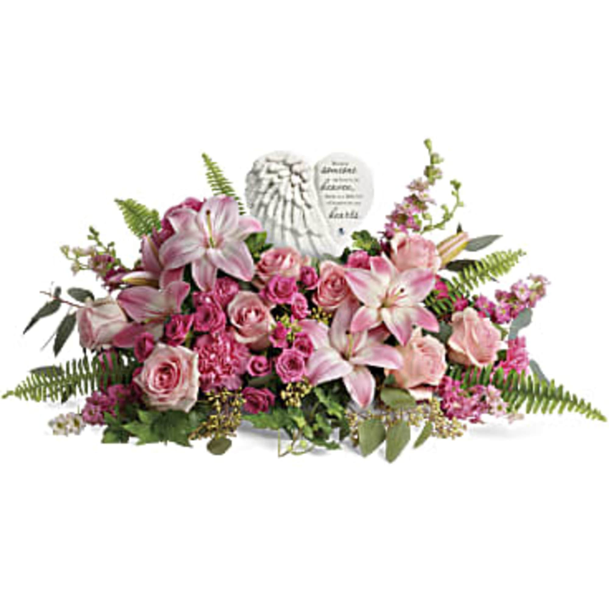 Pink floral arrangement with a heart-shaped memorial plaque