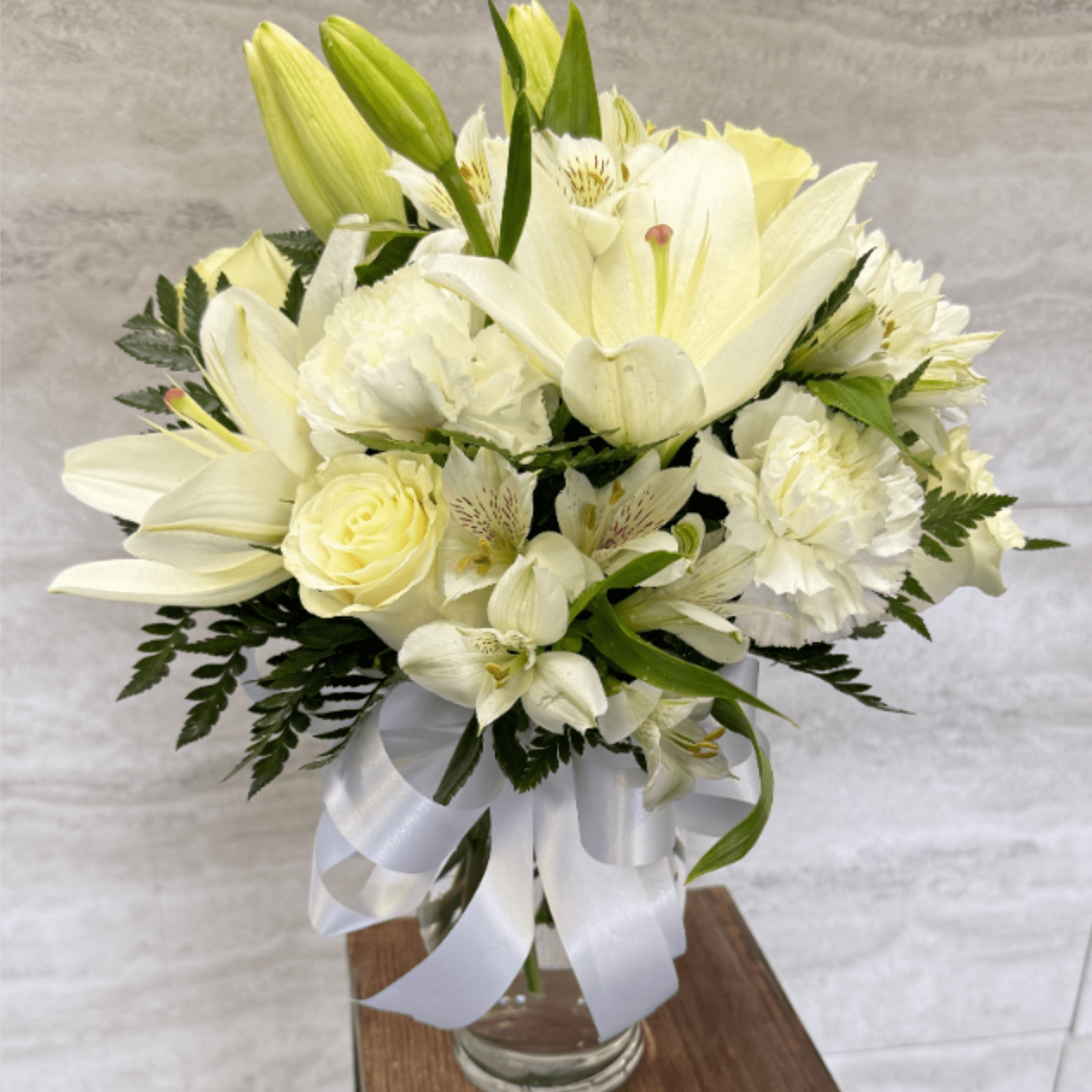 (ALL-ROUND) A dreamy all-white bouquet featuring elegant roses, soft cushions, and graceful