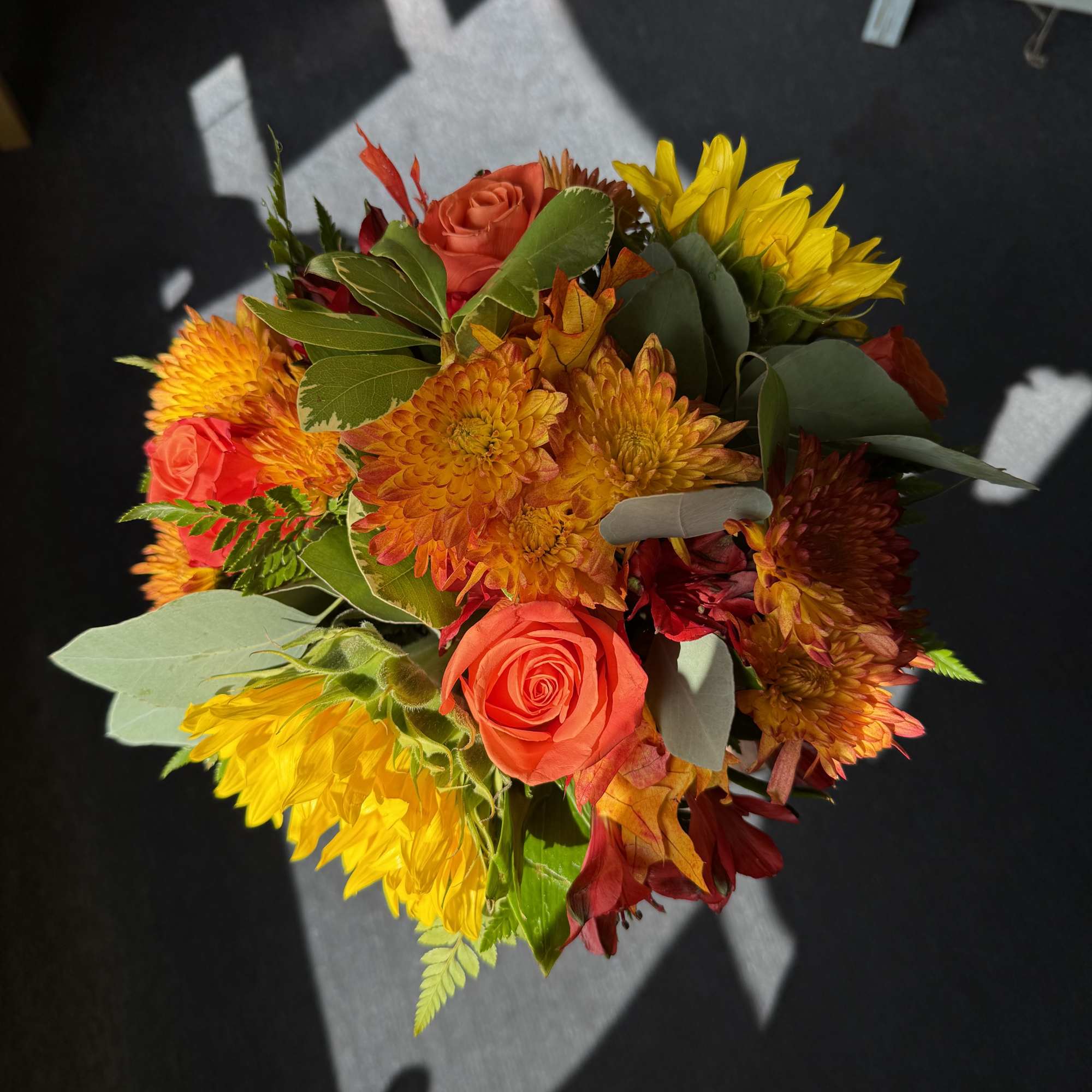 Bouquet of orange roses and yellow chrysanthemums