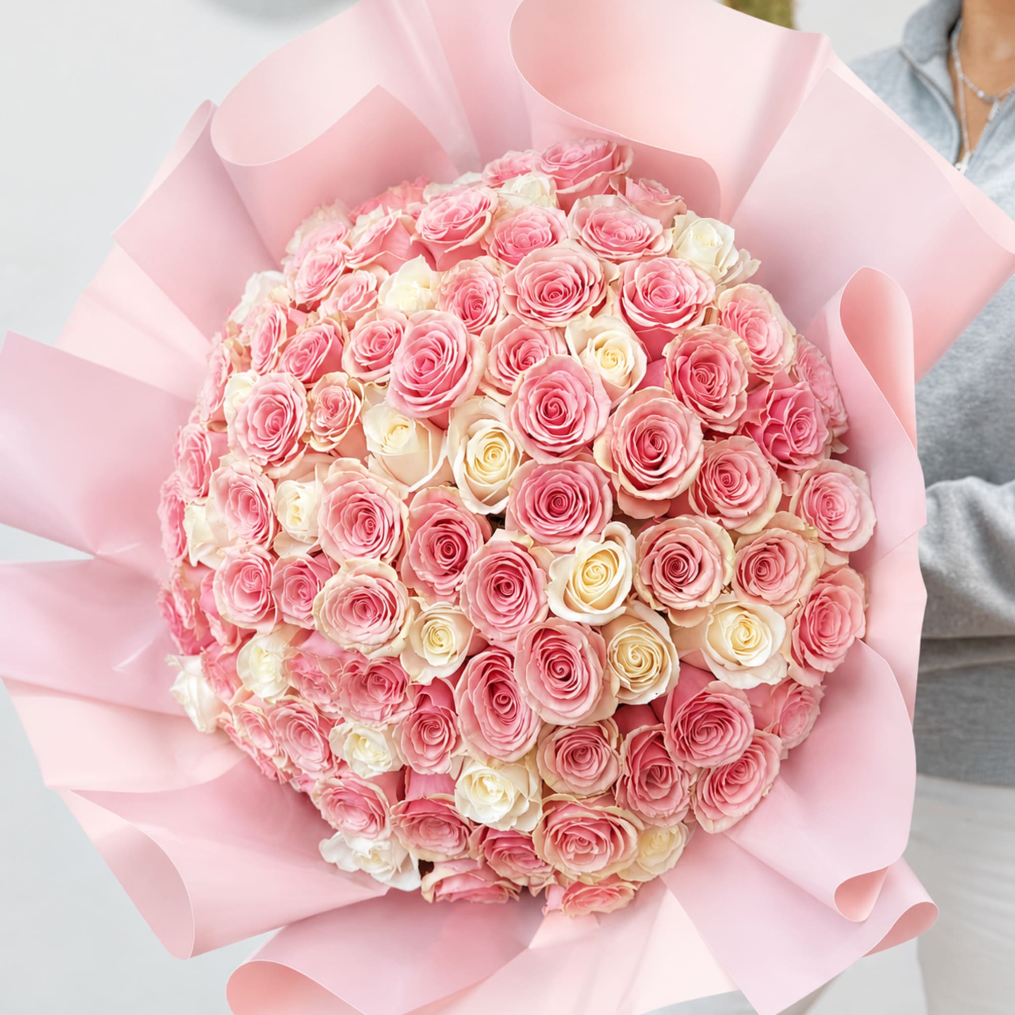 100 long-stem pink and white roses with decorative wrapping paper. One hundred, photo 2 of 2