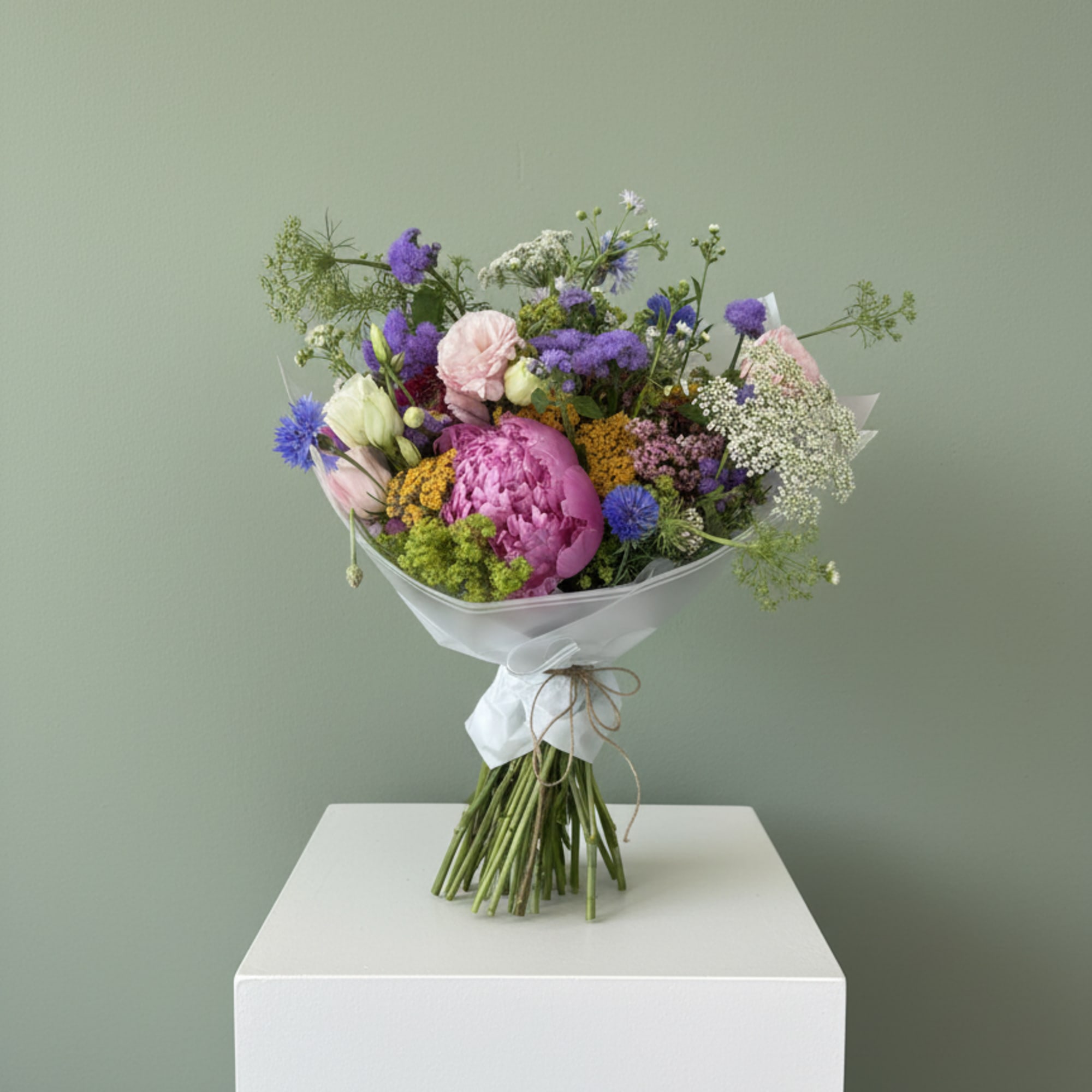 This hand tied bouquet is filled with summer&rsquo;s best blooms the season