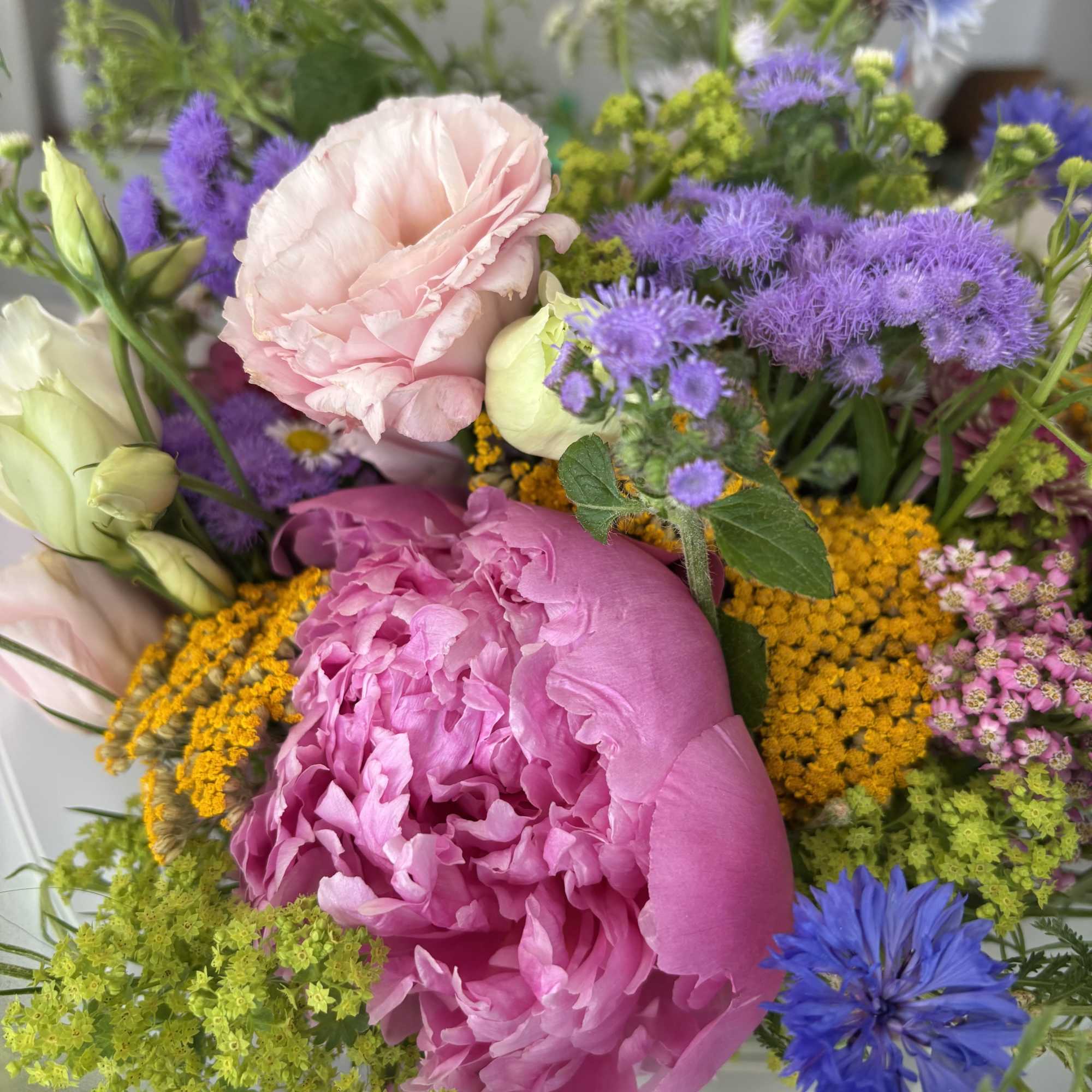 This hand tied bouquet is filled with summer&rsquo;s best blooms the season