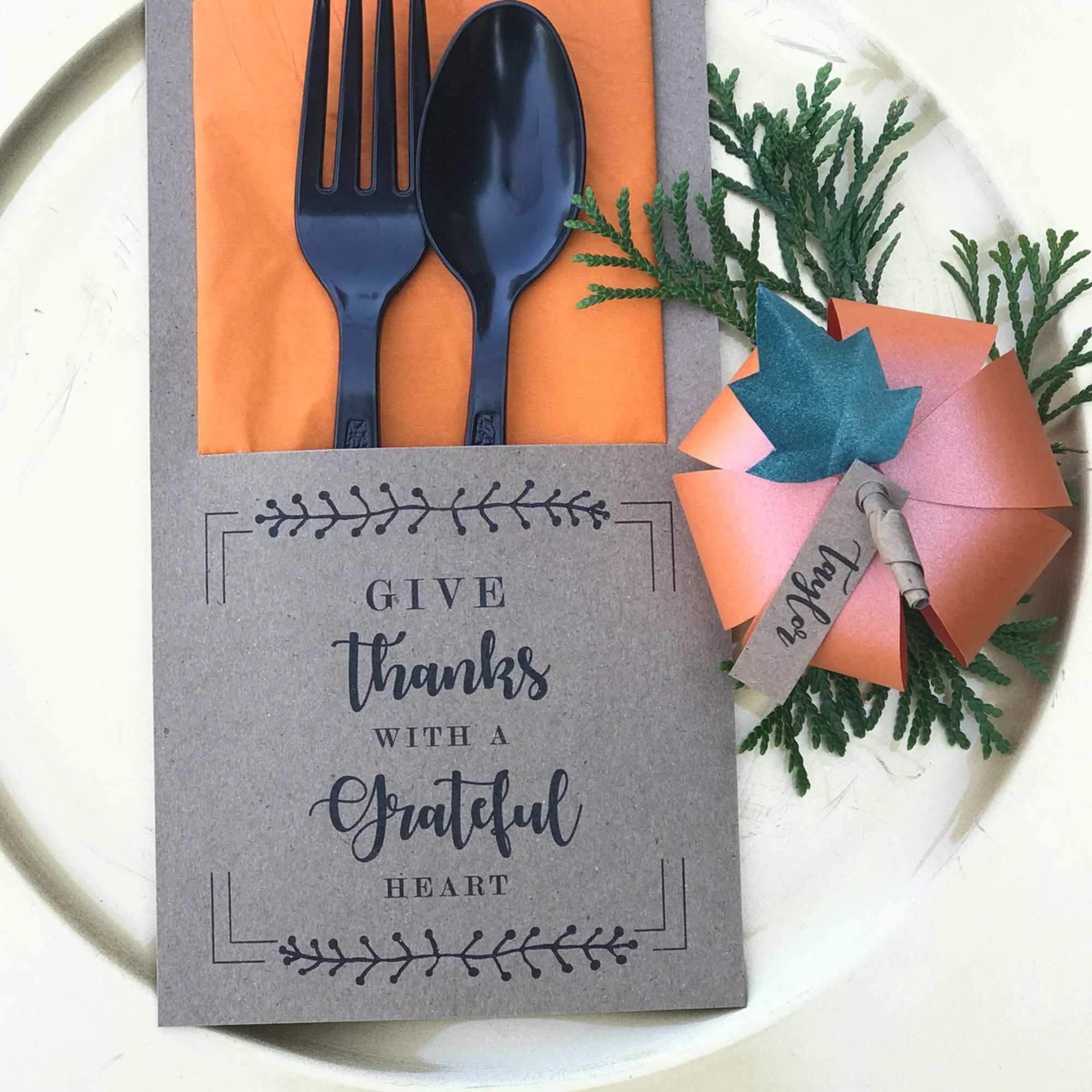Thank-you gift set with a card, plastic cutlery, and a paper favor box