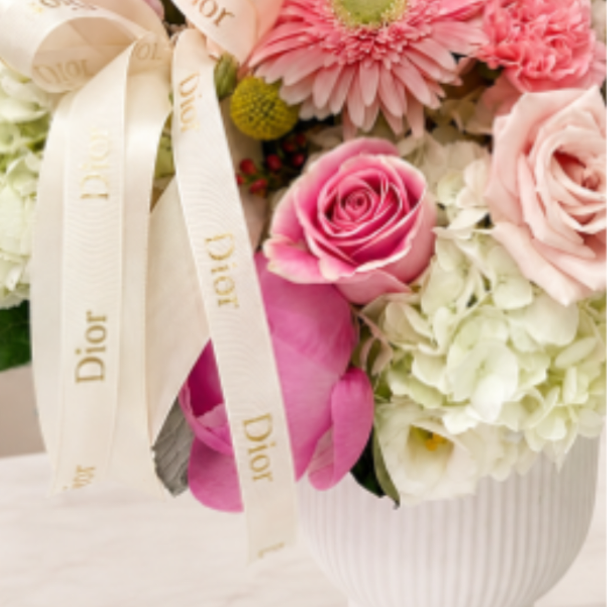 A delicate expression of beauty and elegance. 
This sophisticated floral arrangement is, photo 2 of 2
