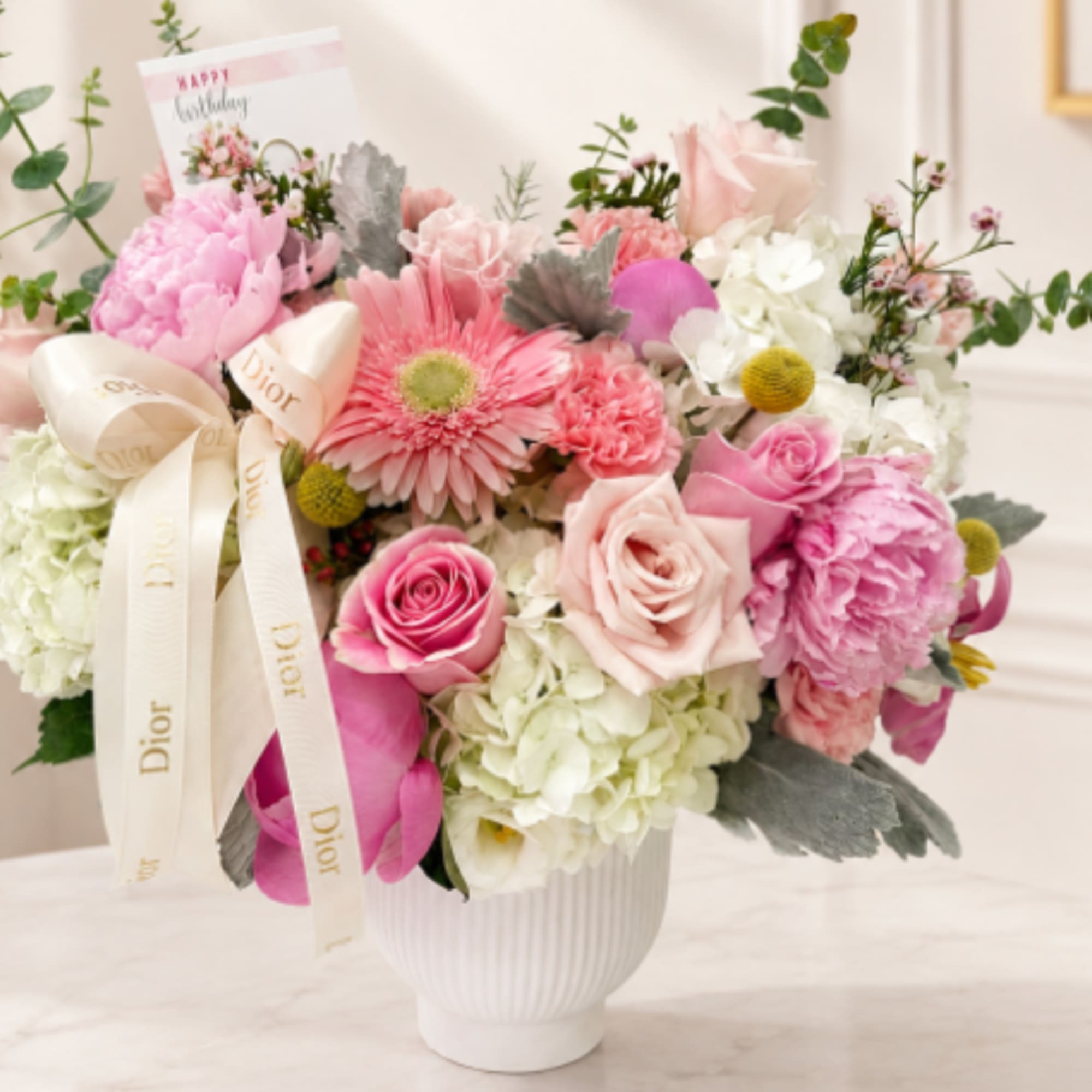 A delicate expression of beauty and elegance. 
This sophisticated floral arrangement is