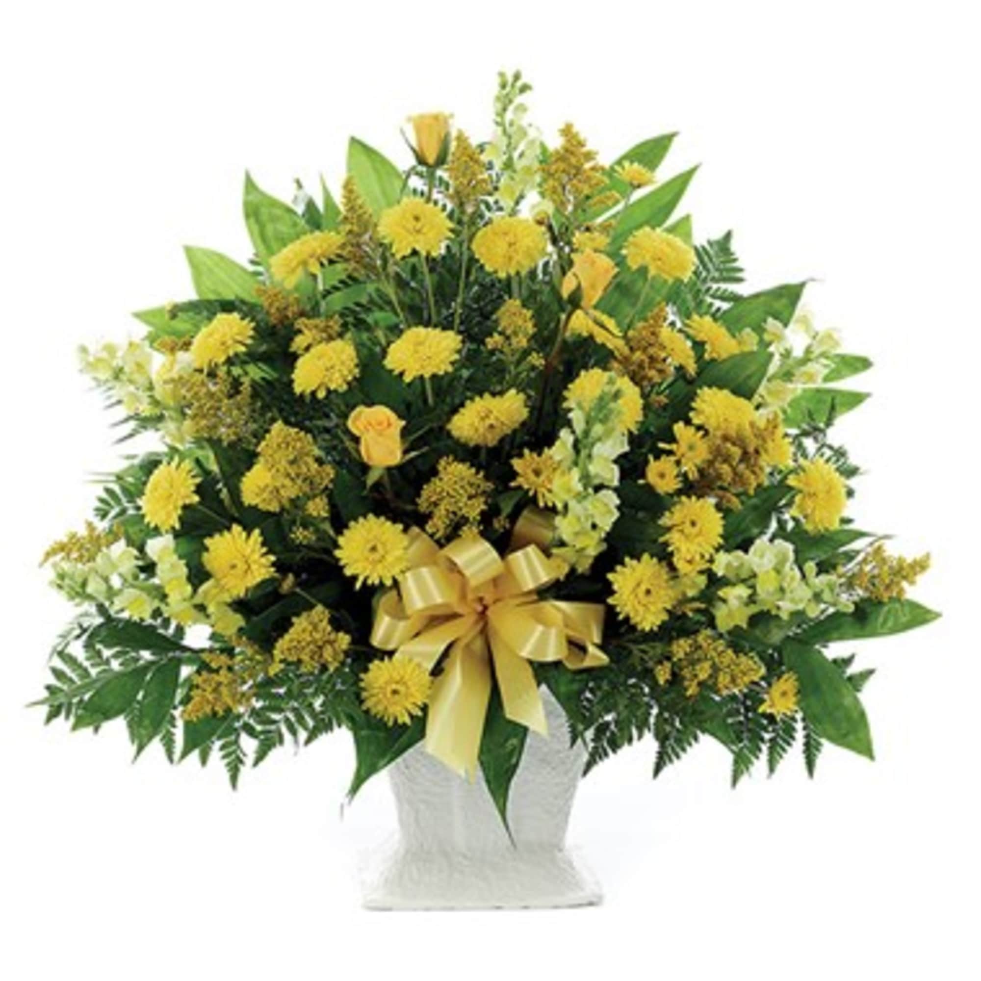 Yellow floral arrangement in a white vase with a gold ribbon