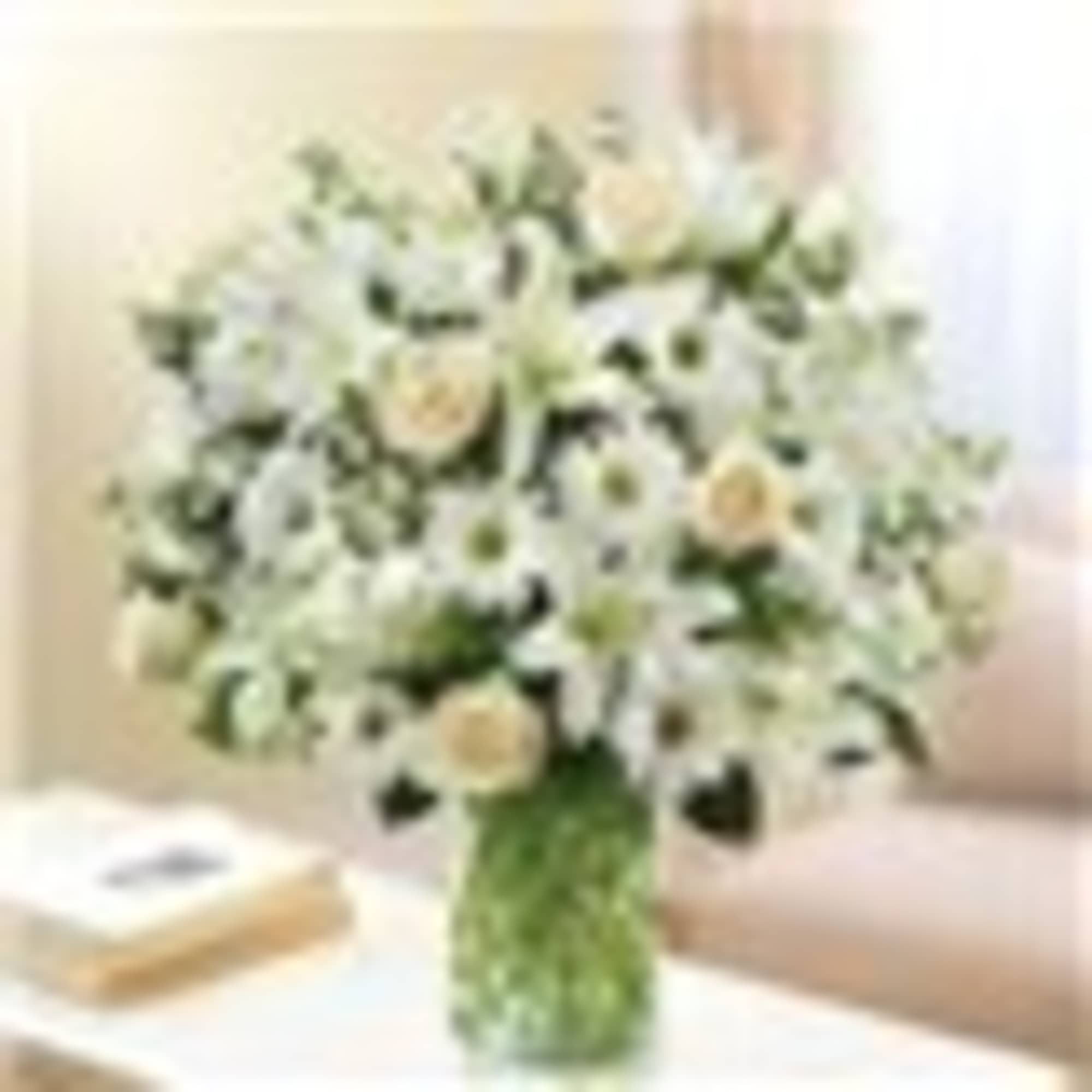 White floral bouquet in a glass vase