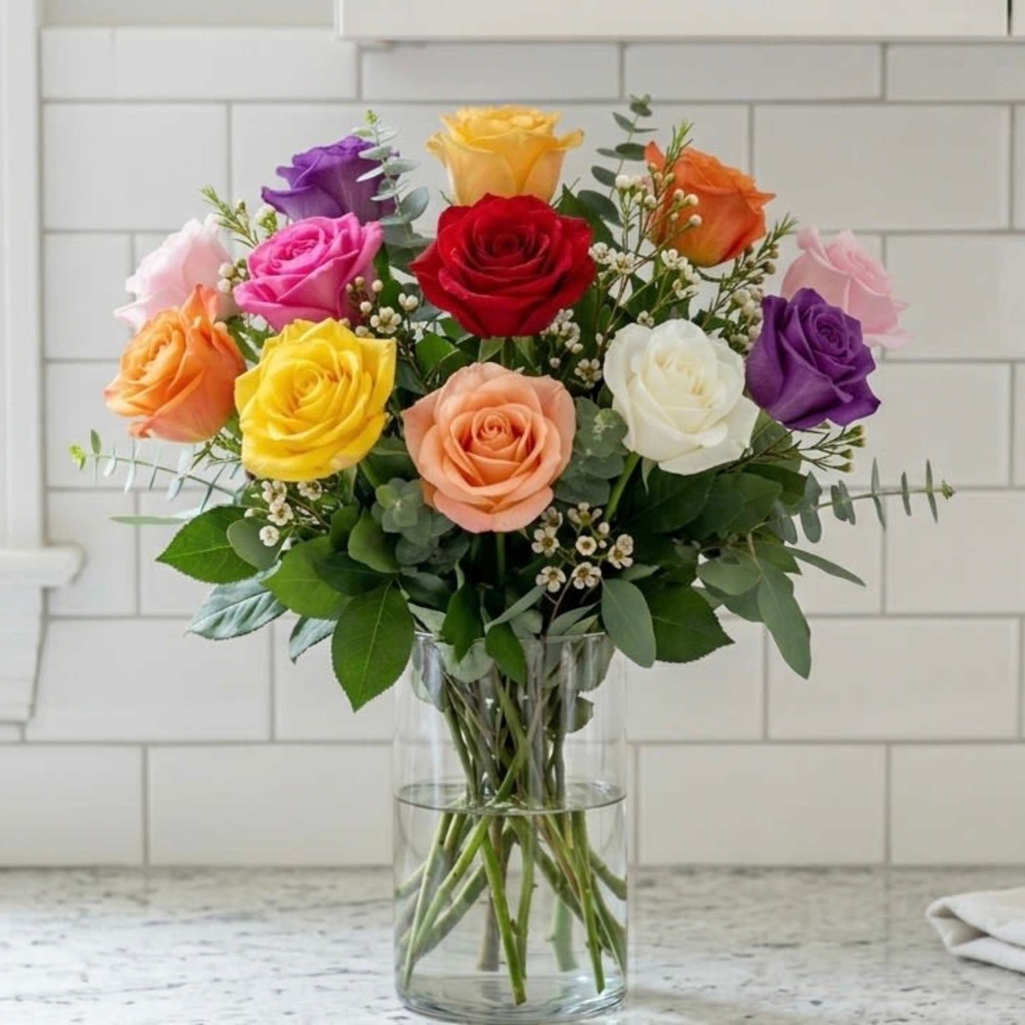 This cheerful rose bouquet showcases a variety of colors. 