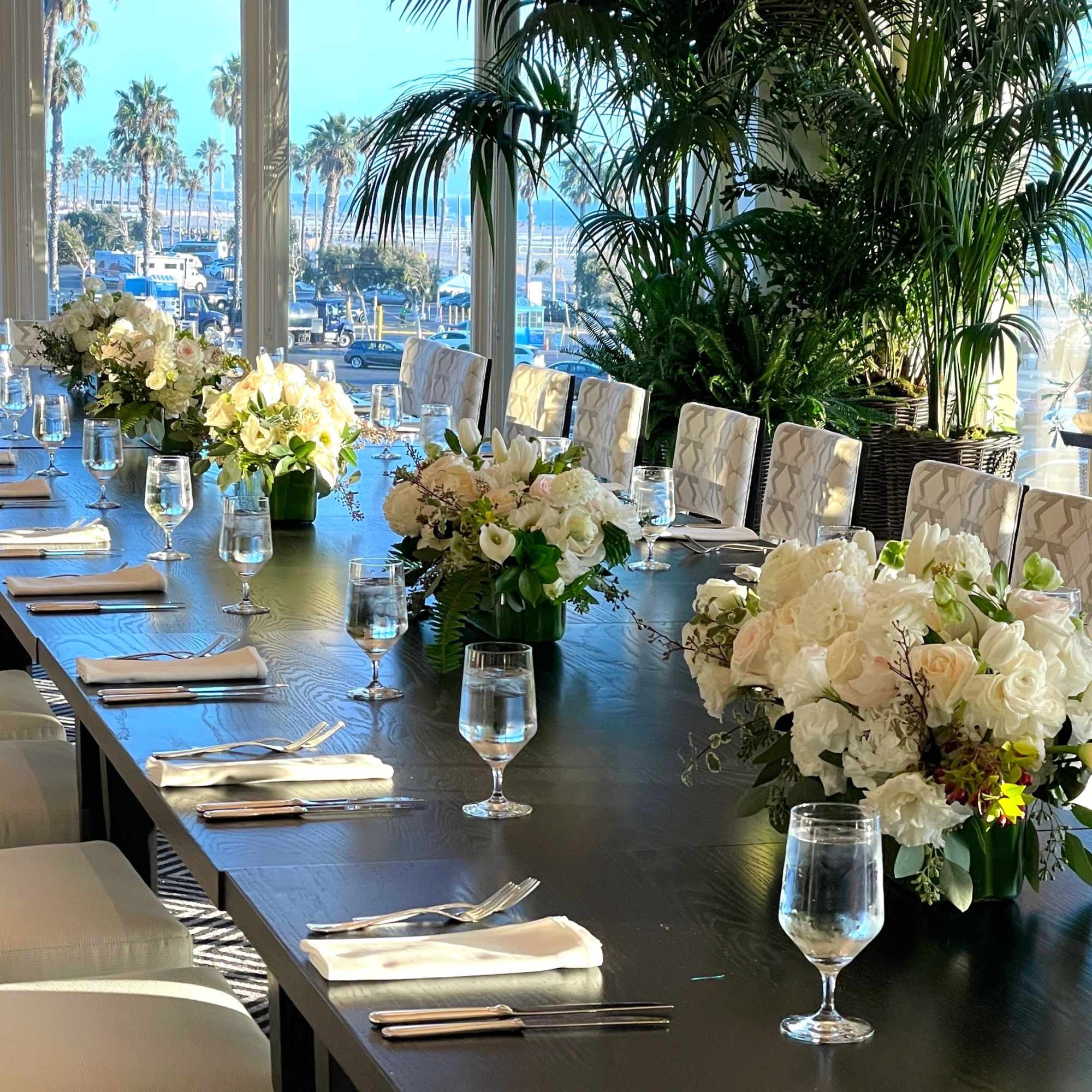 Hydrangea, Premium Roses, Dahlias, Tulips, Eucalyptus, and more greenery in long glass