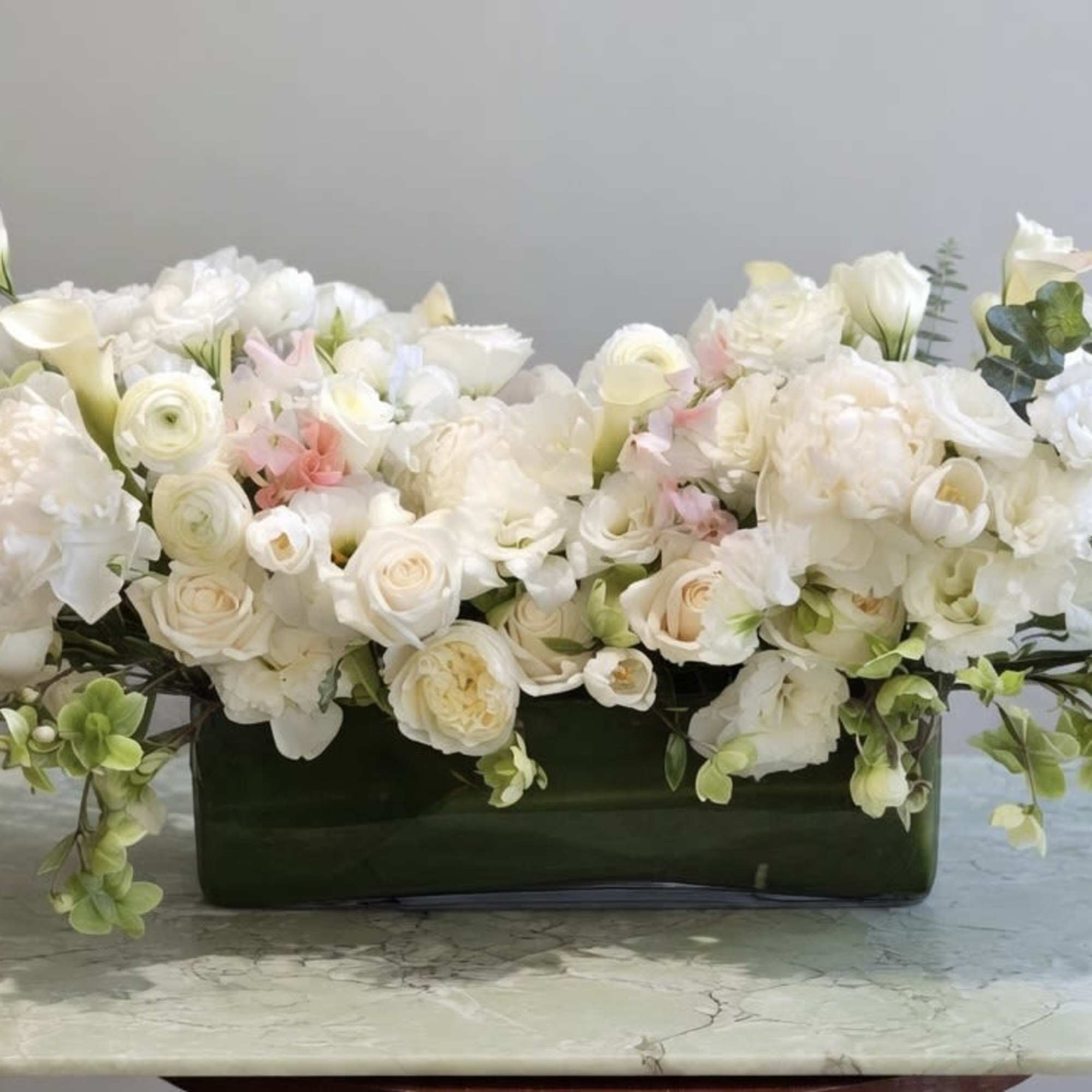 Premium Roses, Hydrangea, Cymbidium Orchid and more flowers in rectangle glass vase
(W18"x