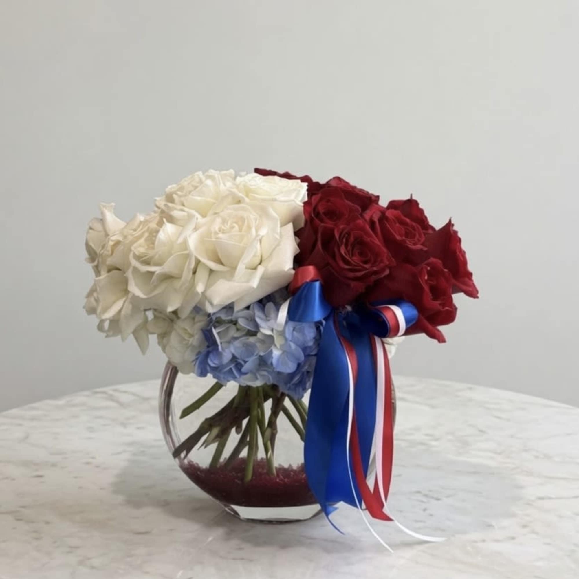 This arrangement is a graceful tribute to timeless American elegance. Rich red, photo 2 of 2