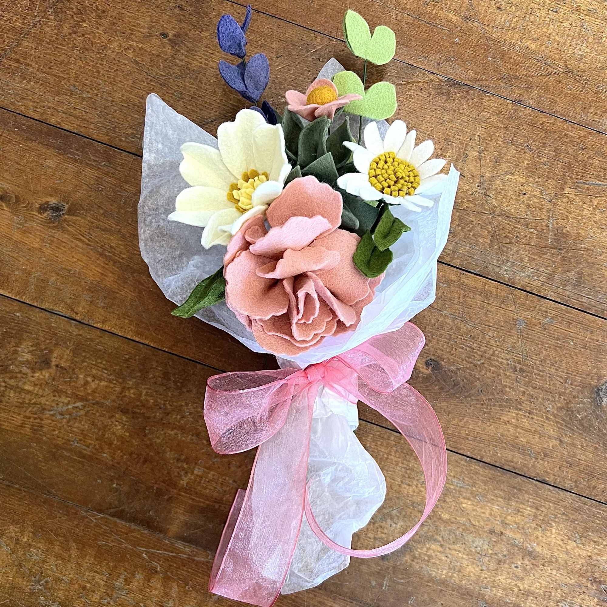 Handcrafted felt flowers arranged in beautiful bouquet that will last for years