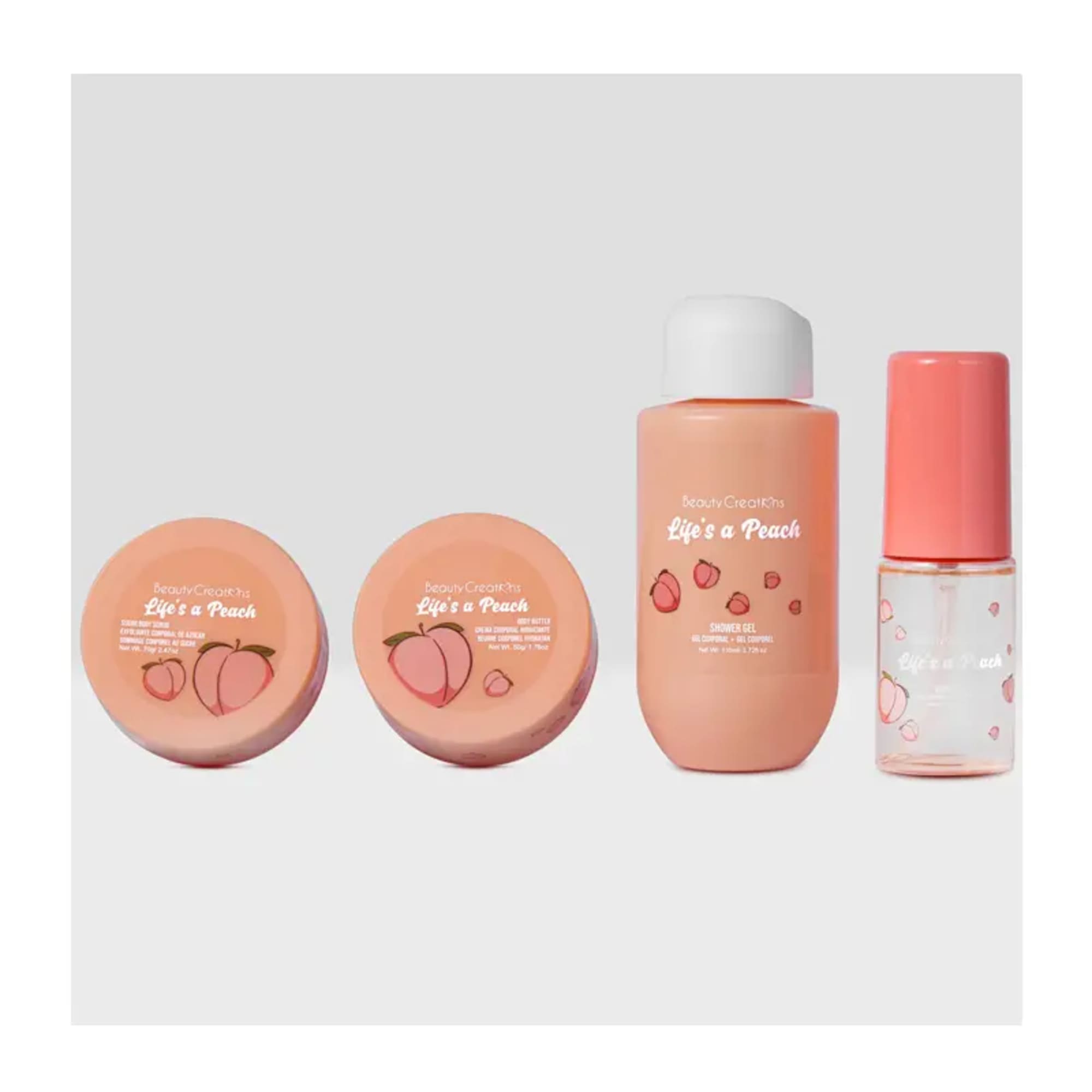 Peach-colored beauty products with peach graphics arranged in a row