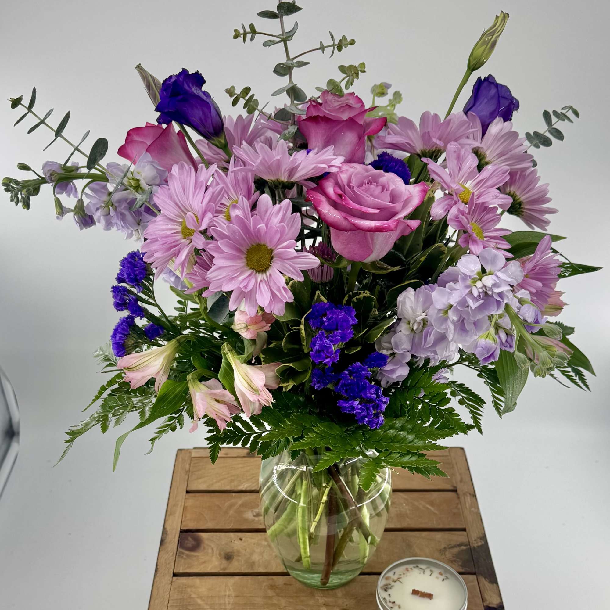 Introducing "Breezy Lavender", a breathtakingly beautiful flower arrangement that is sure to