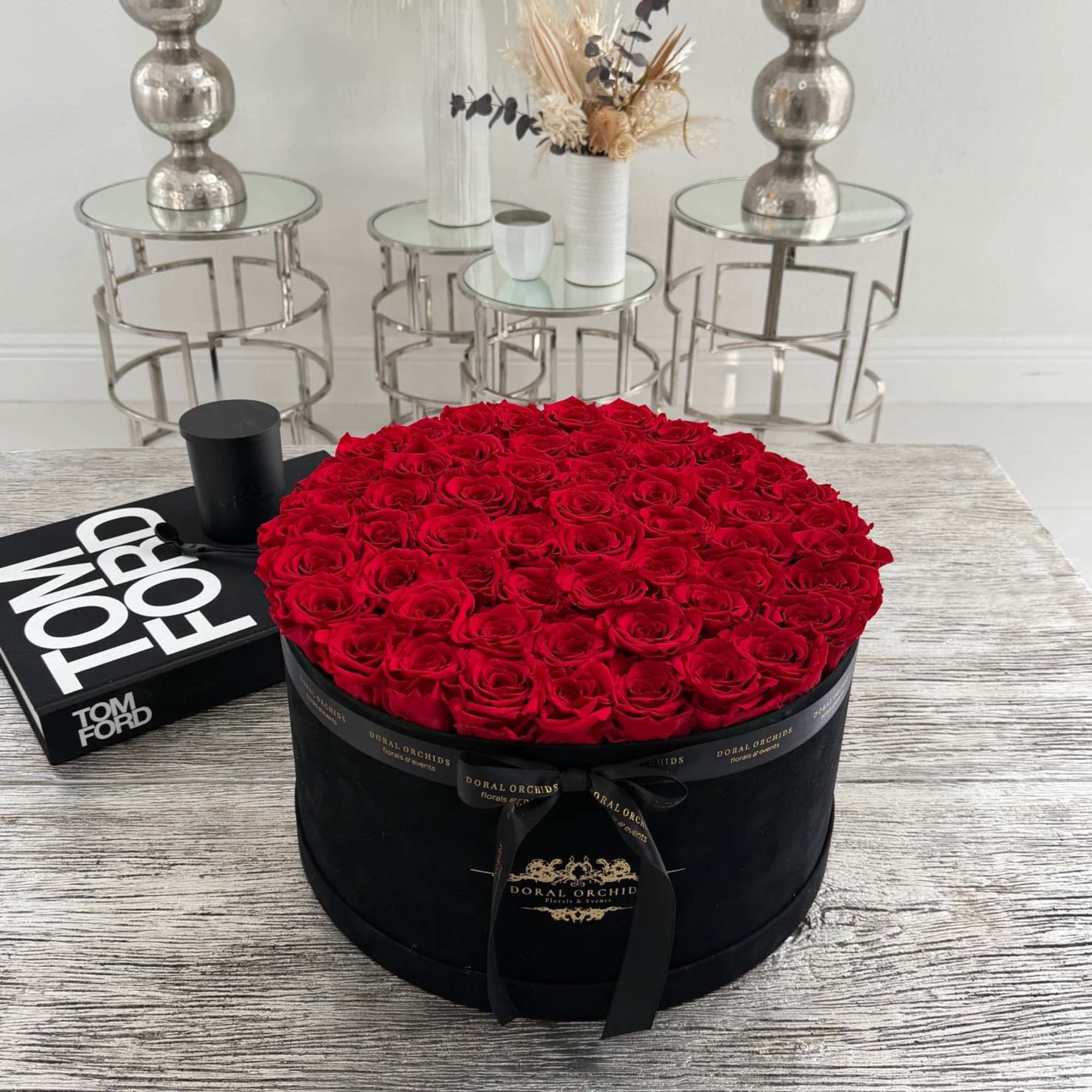 A striking expression of luxury and romance, this grand round arrangement features