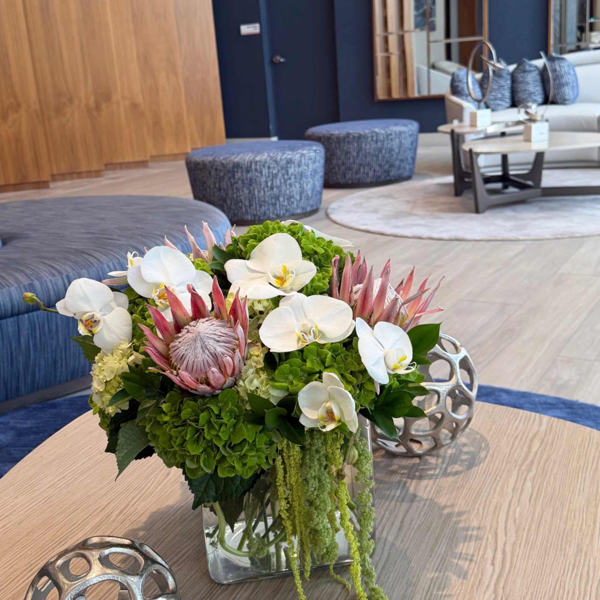 A bold and elevated design, this arrangement features elegant white phalaenopsis orchids, photo 2 of 4