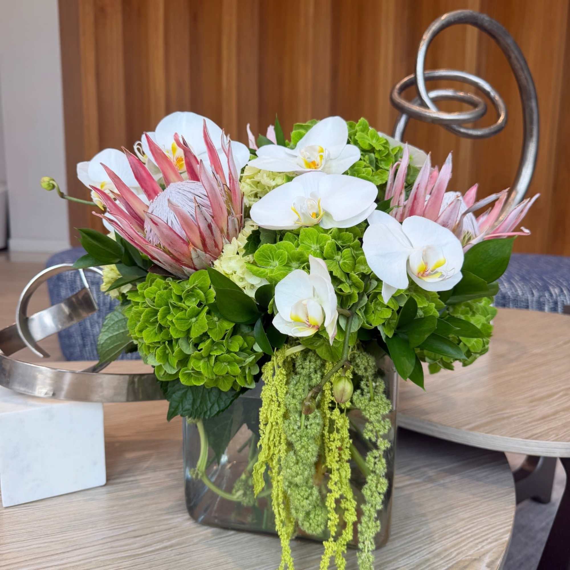 A bold and elevated design, this arrangement features elegant white phalaenopsis orchids, photo 4 of 4