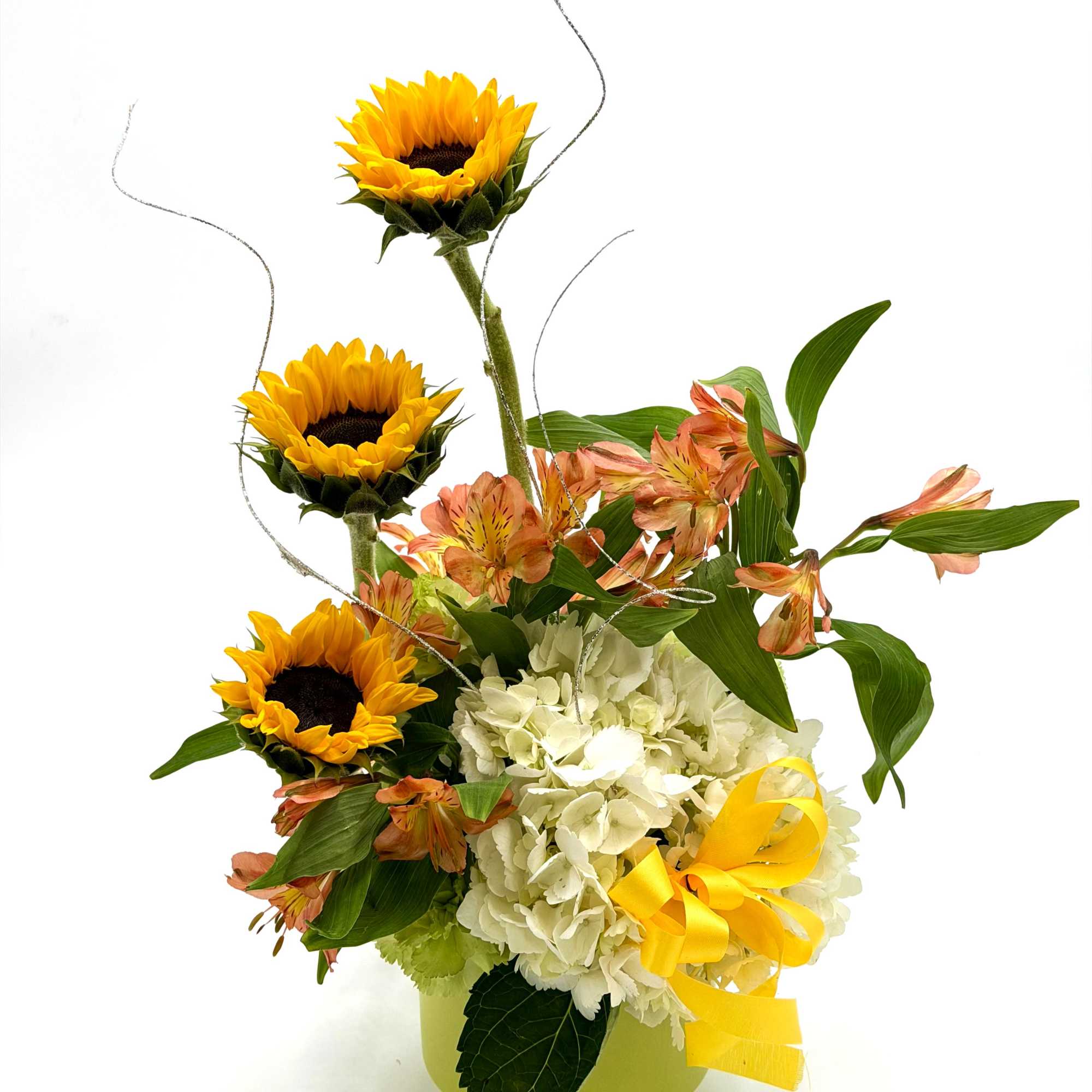 Sunshine and Grace is a cheerful arrangement that brings warmth and elegance