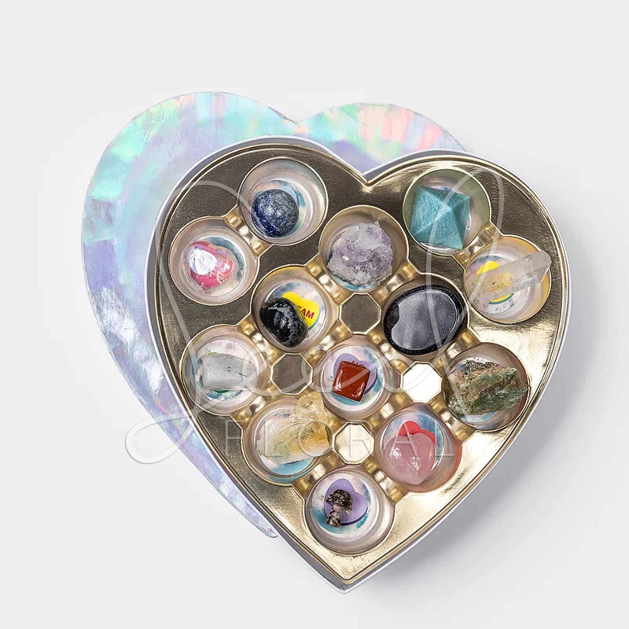 Heart-shaped box with assorted small crystals and stones