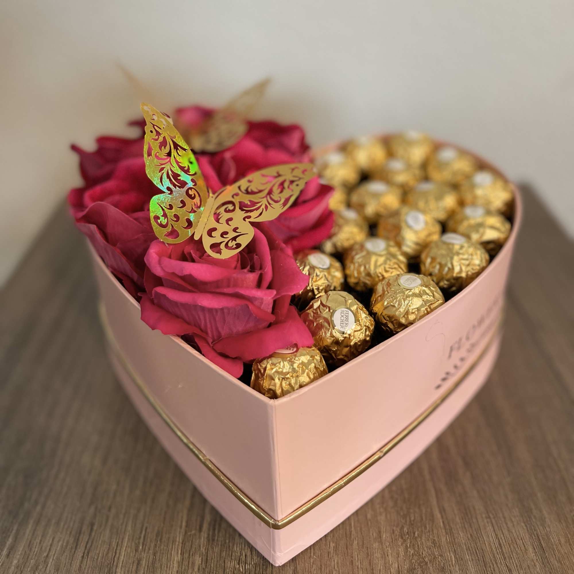 Heart-shaped box with pink roses and gold-wrapped chocolates, photo 2 of 2