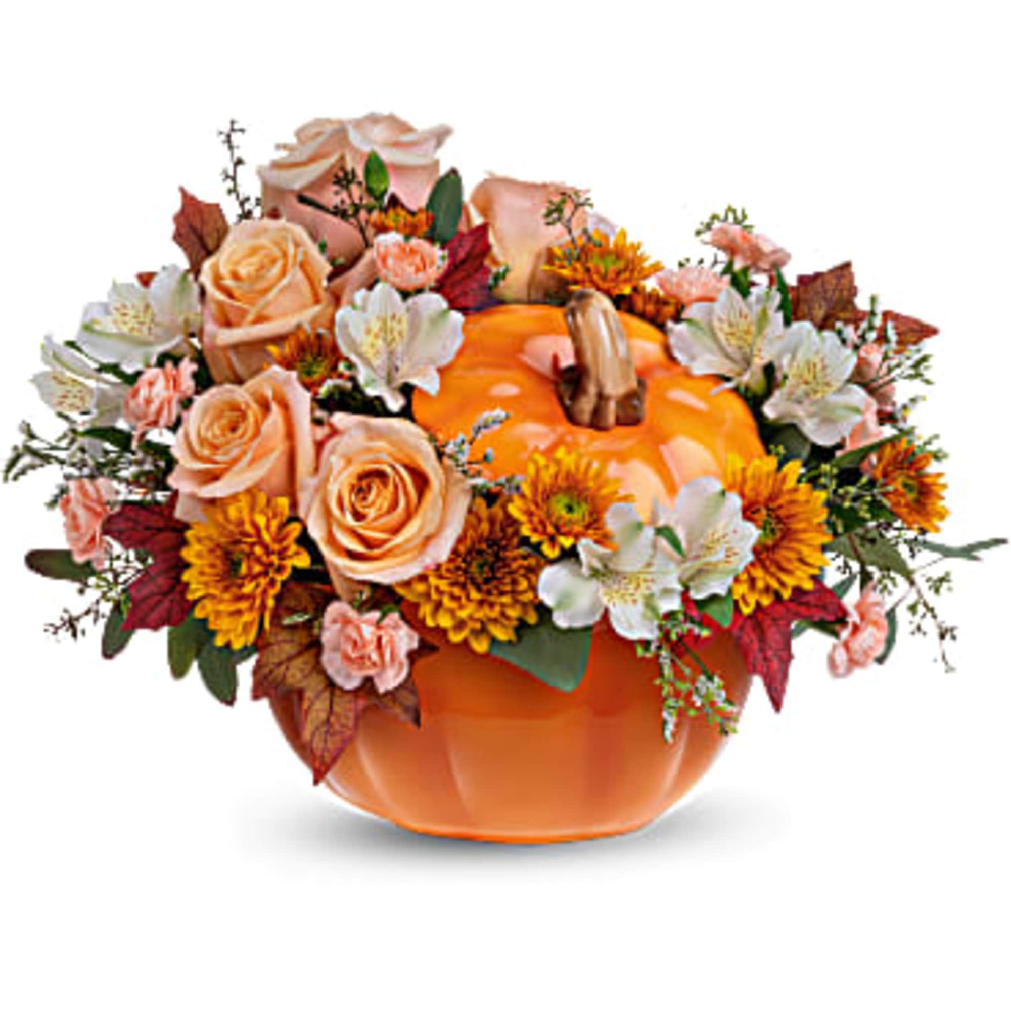 Pumpkin-shaped vase with peach roses and autumn flowers