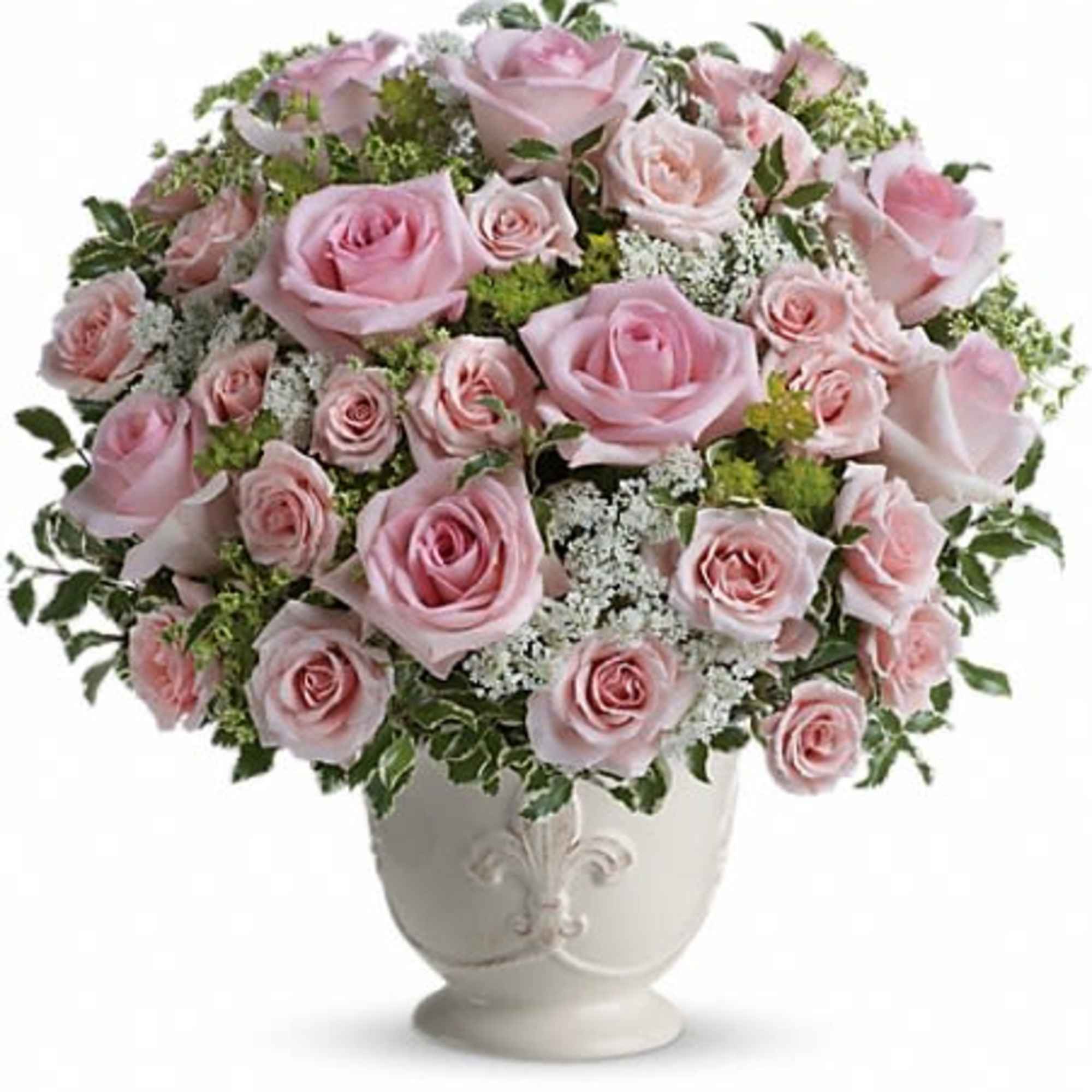Pink roses arranged in a white vase