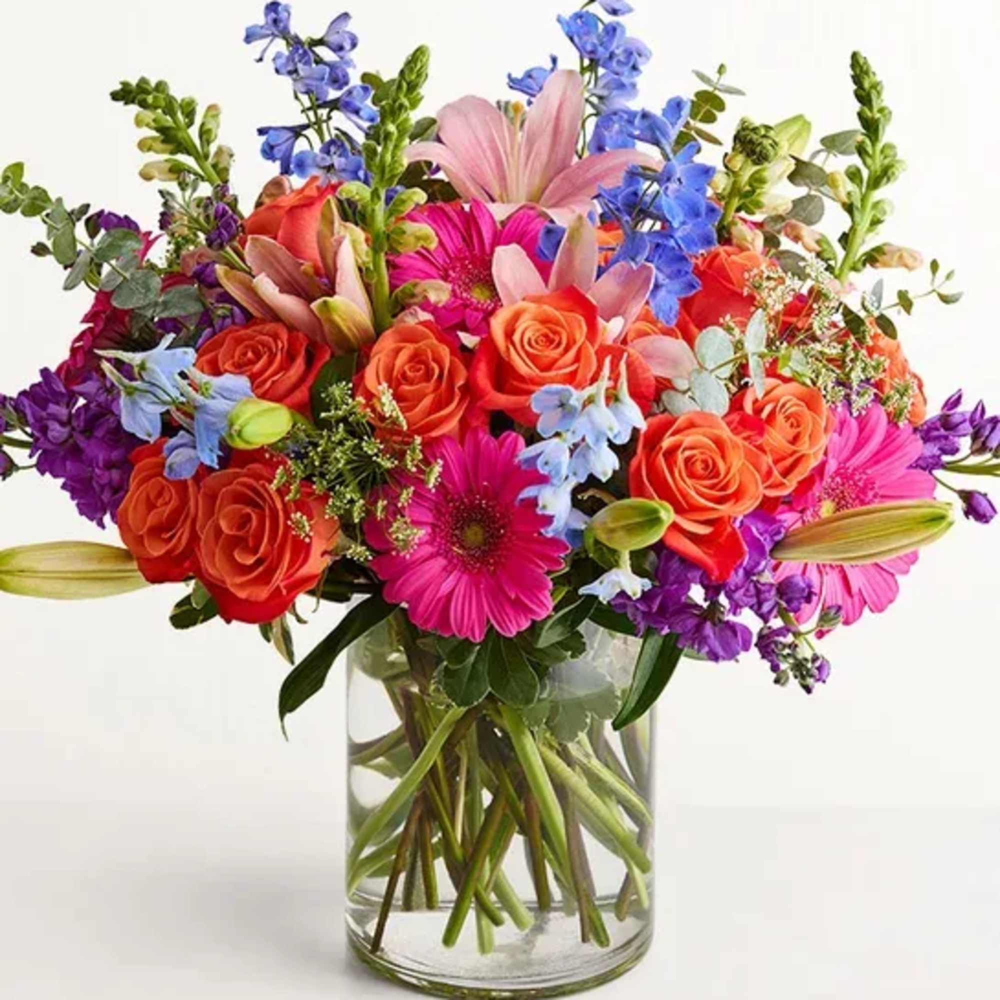A fresh-from-the-meadow design makes this colorful bouquet a true delight. Orange roses