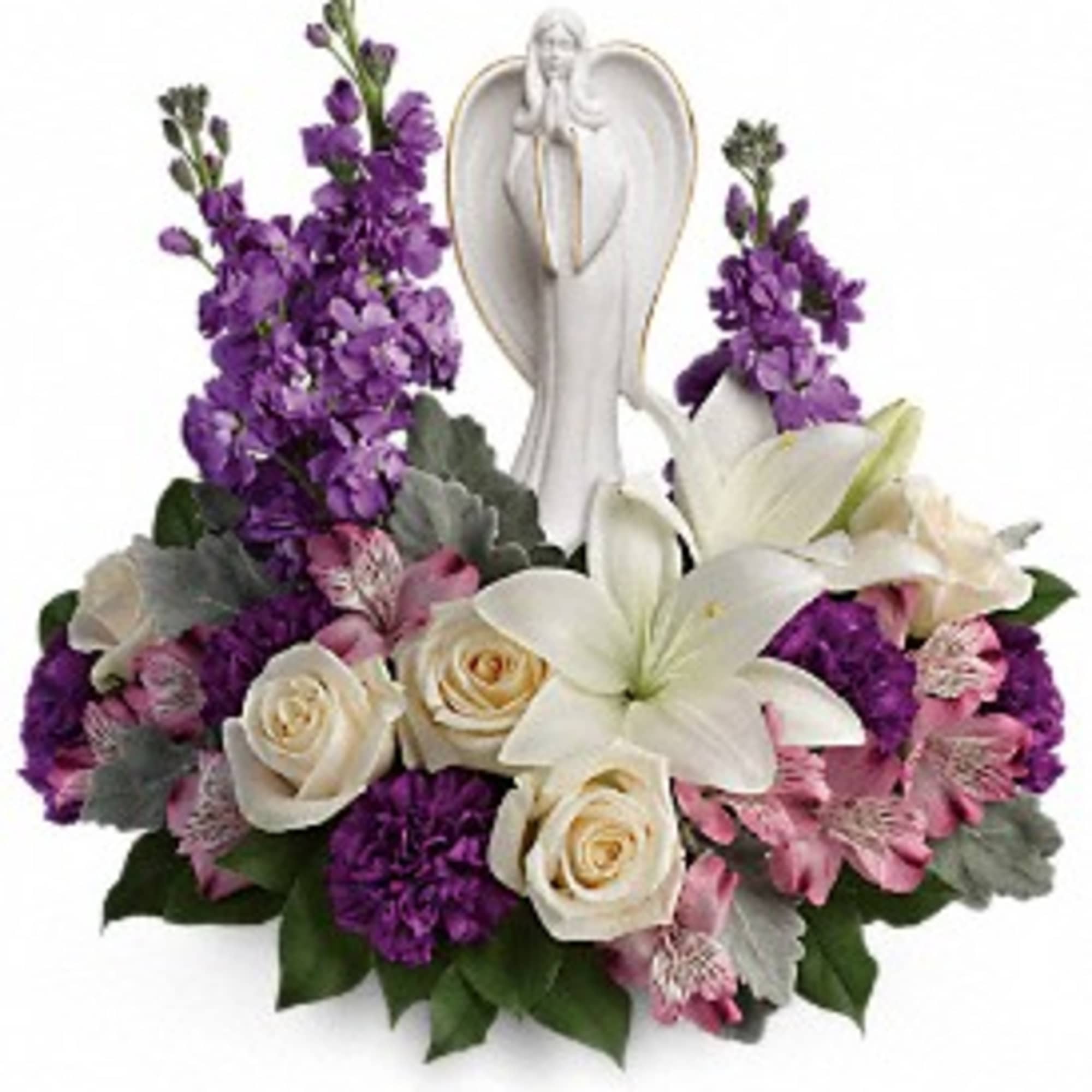 Purple and white floral arrangement with lilies and roses around a white angel figurine
