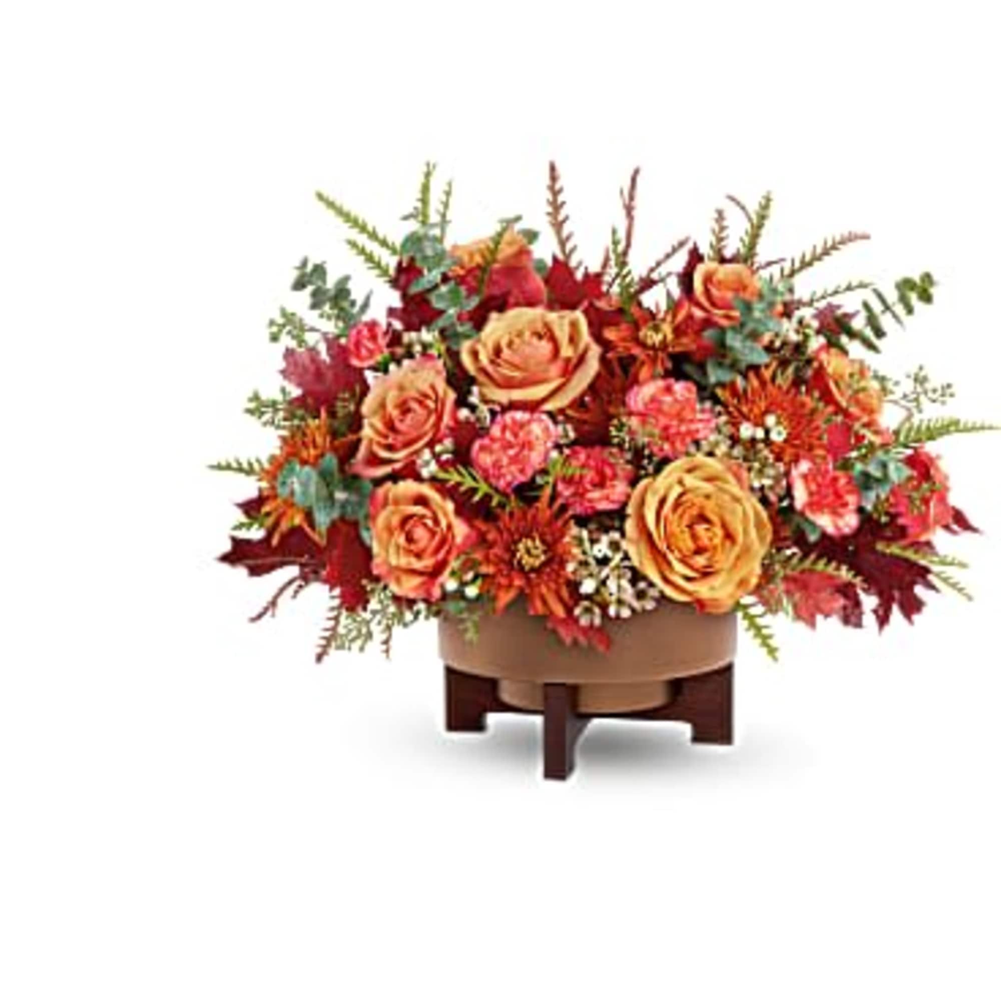Modern Copper Centerpiece brings fall to life with rich seasonal blooms, artfully