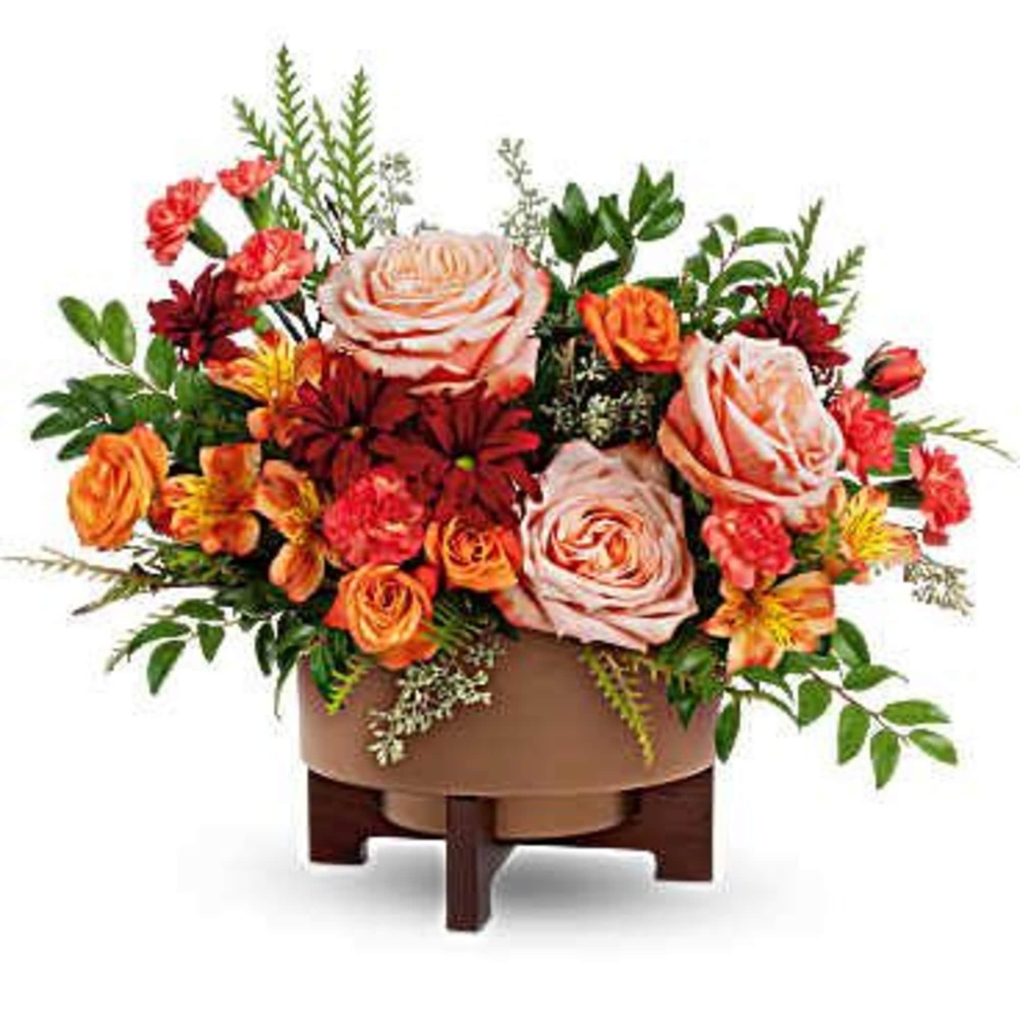 Celebrate the season with warmth and charm. The Copper Celebration Centerpiece captures