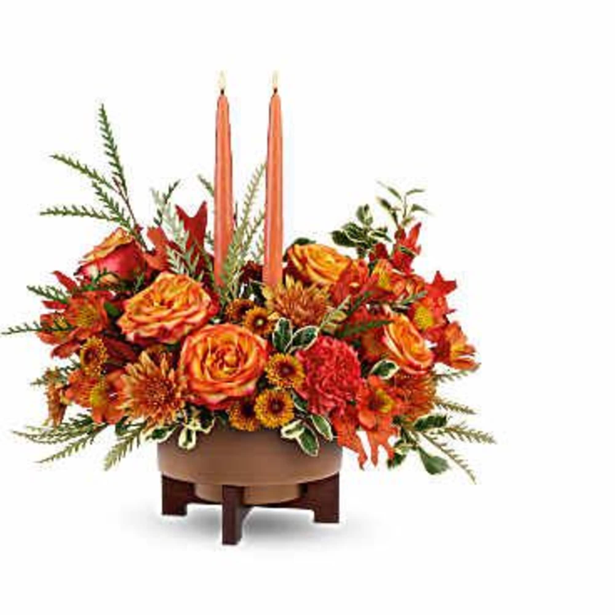 Warm hearts and tables with the Fall Harvest Centerpiece. Featuring two elegant