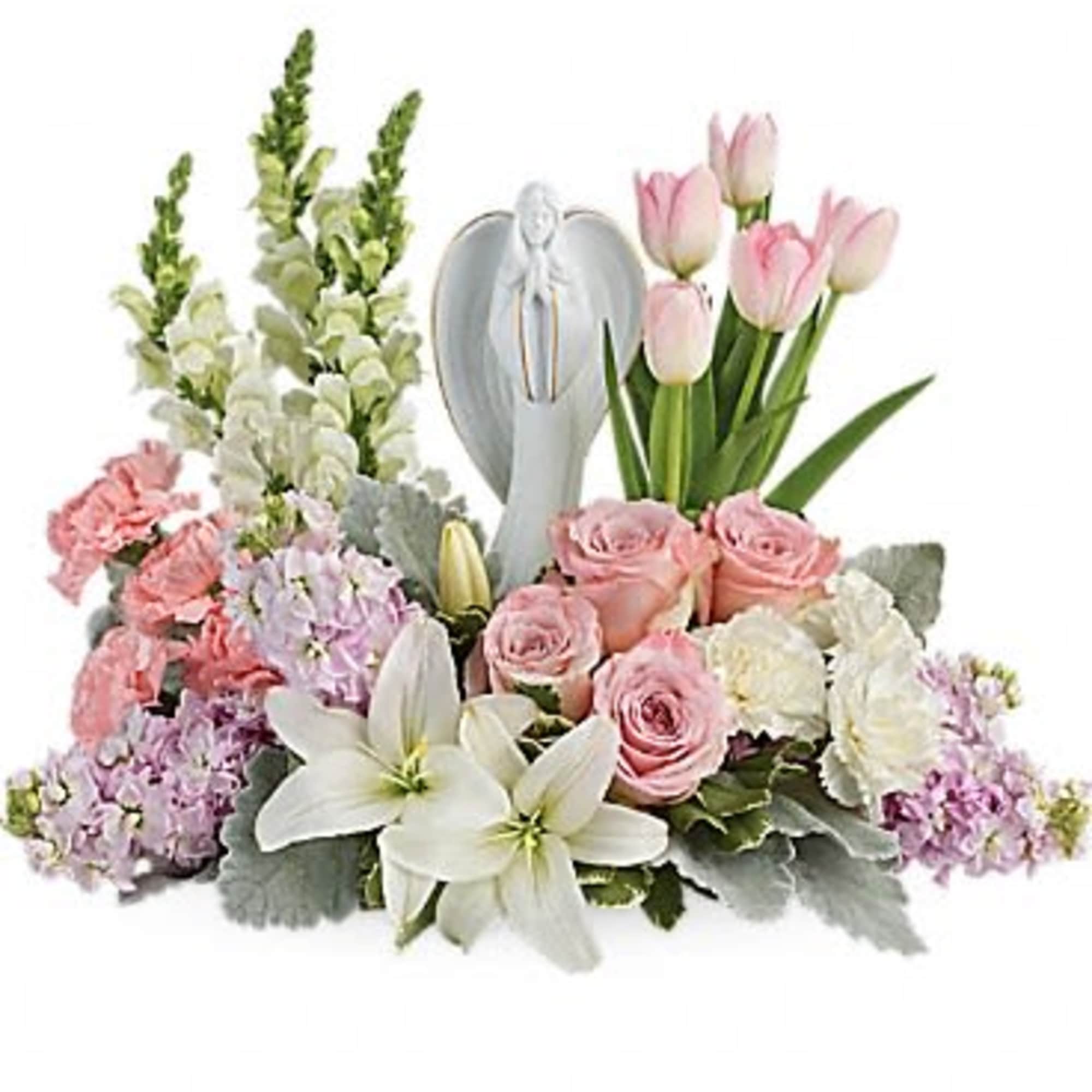Pink roses and white lilies arranged with tulips around a silver heart ornament