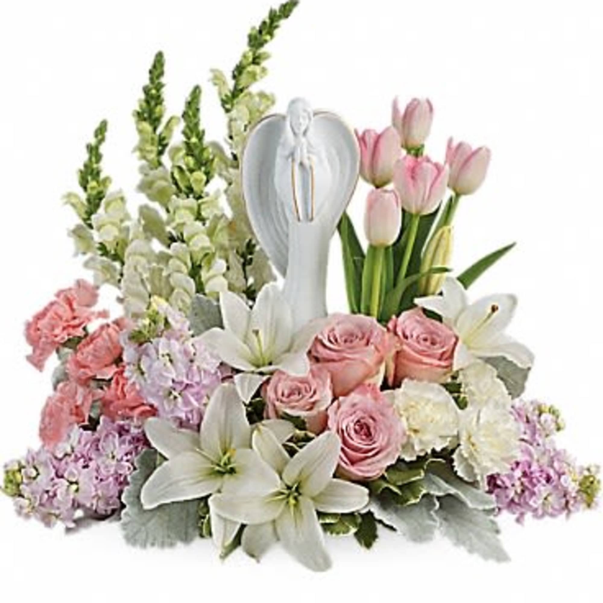 Pink roses and white lilies arranged around a heart-shaped angel ornament
