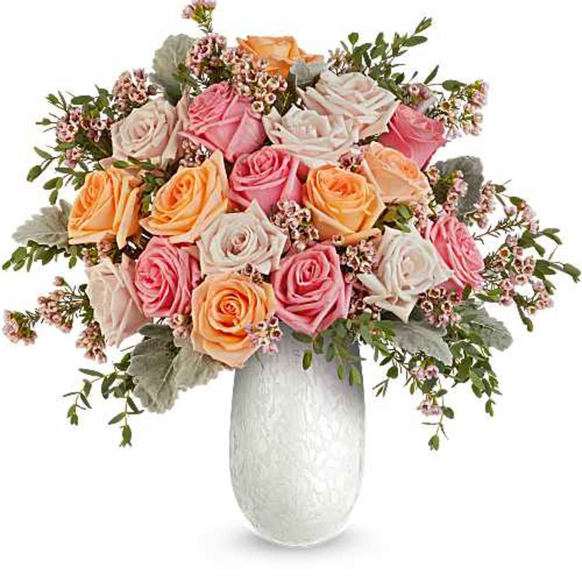 Bouquet of pink, peach, and white roses in a white vase