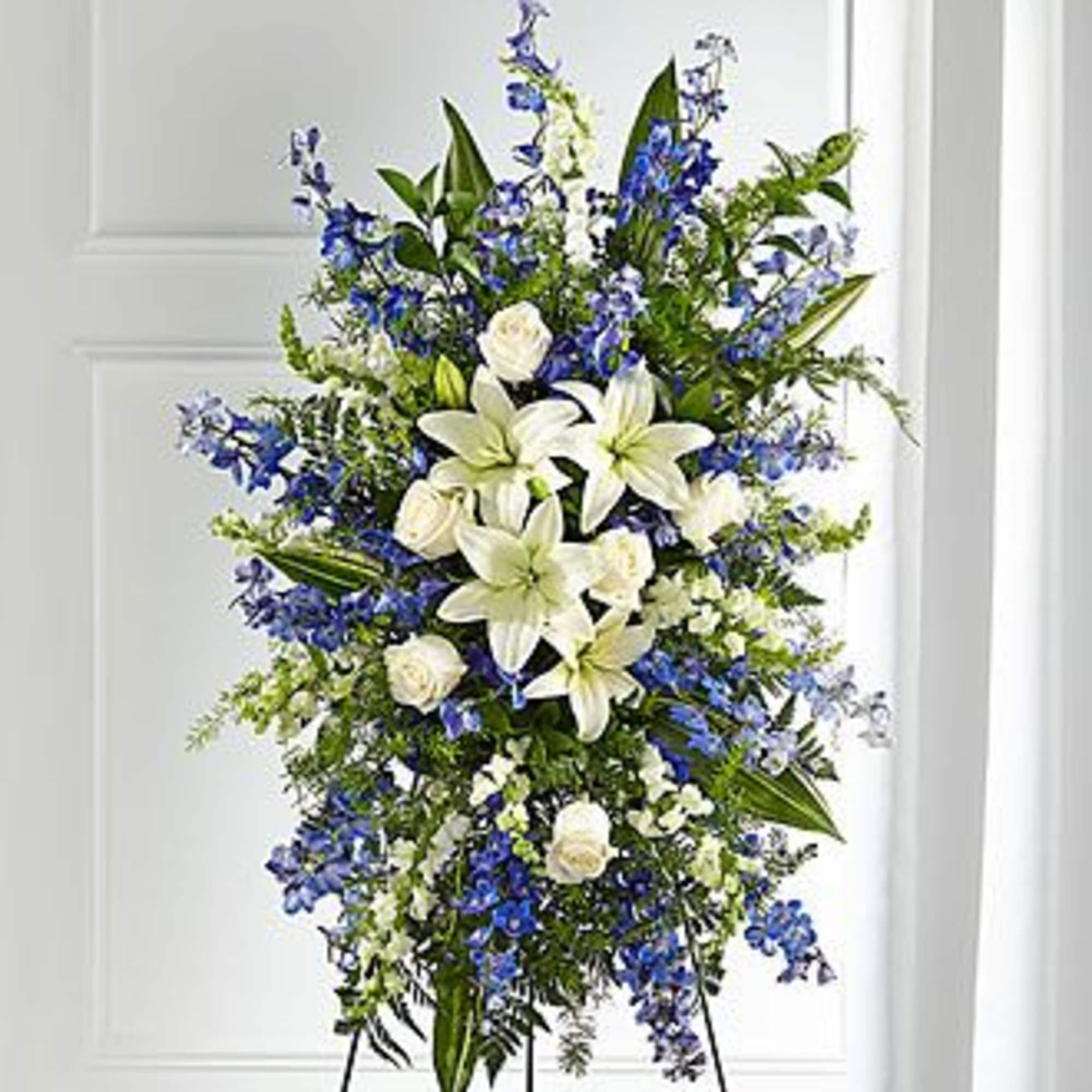 A collection of bold blue flowers shares a tribute that words cannot