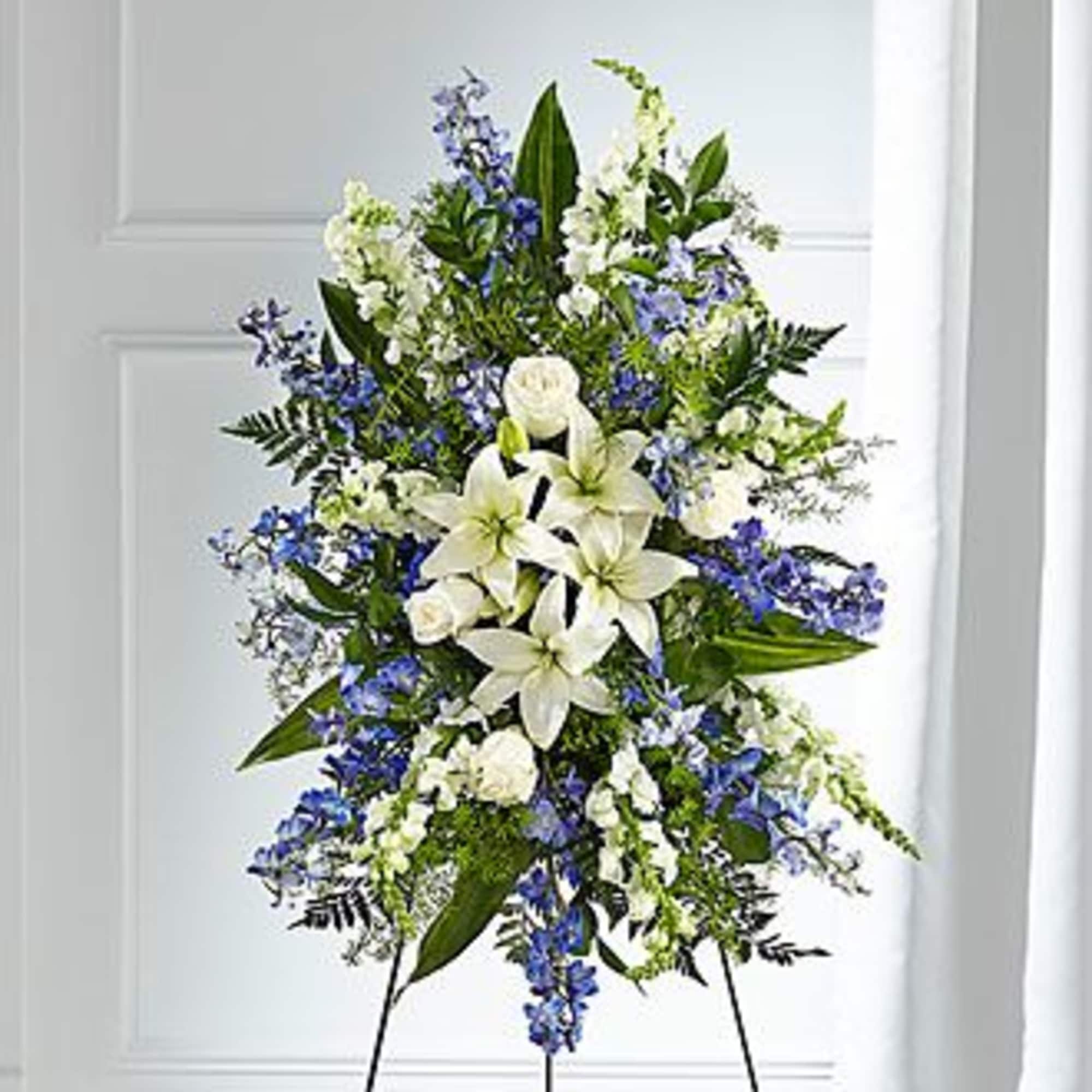 A collection of bold blue flowers shares a tribute that words cannot