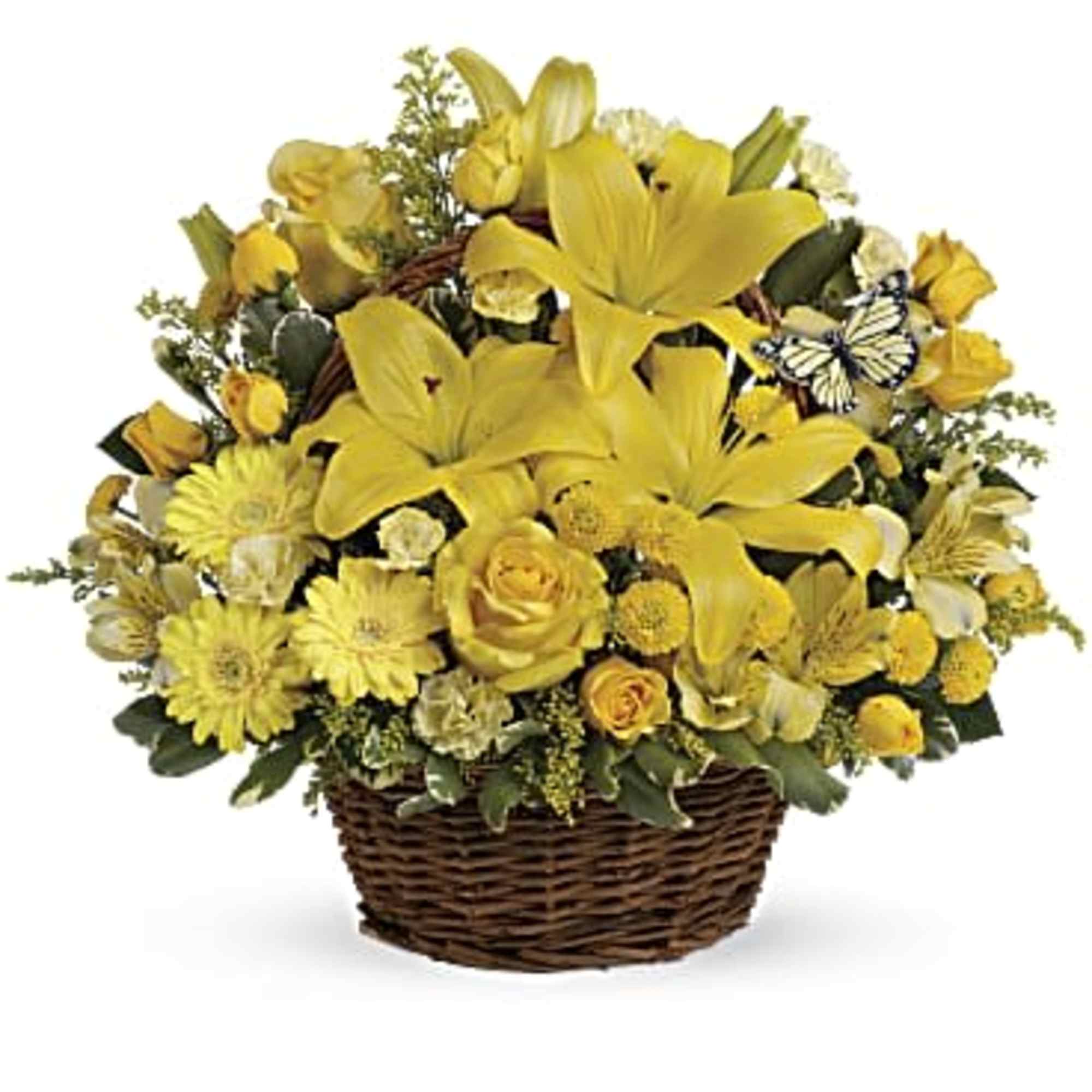Yellow lilies and roses arranged in a wicker basket