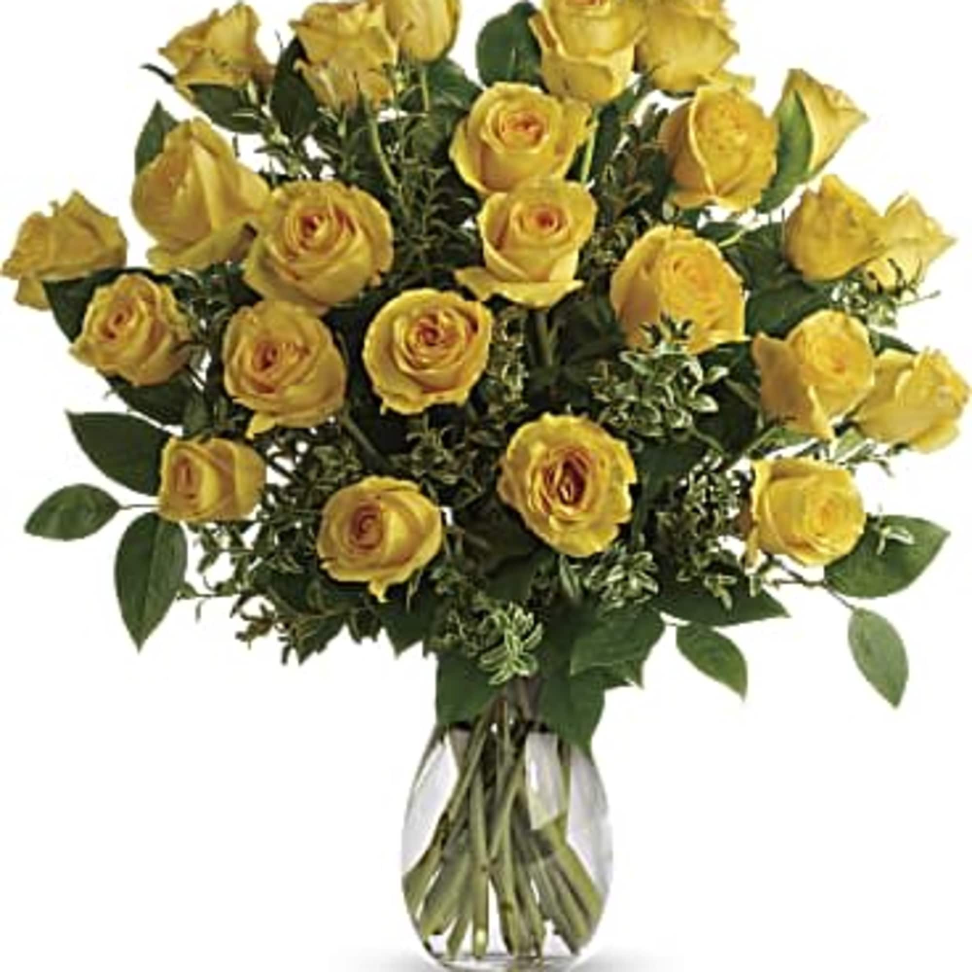 Bouquet of yellow roses in a clear glass vase