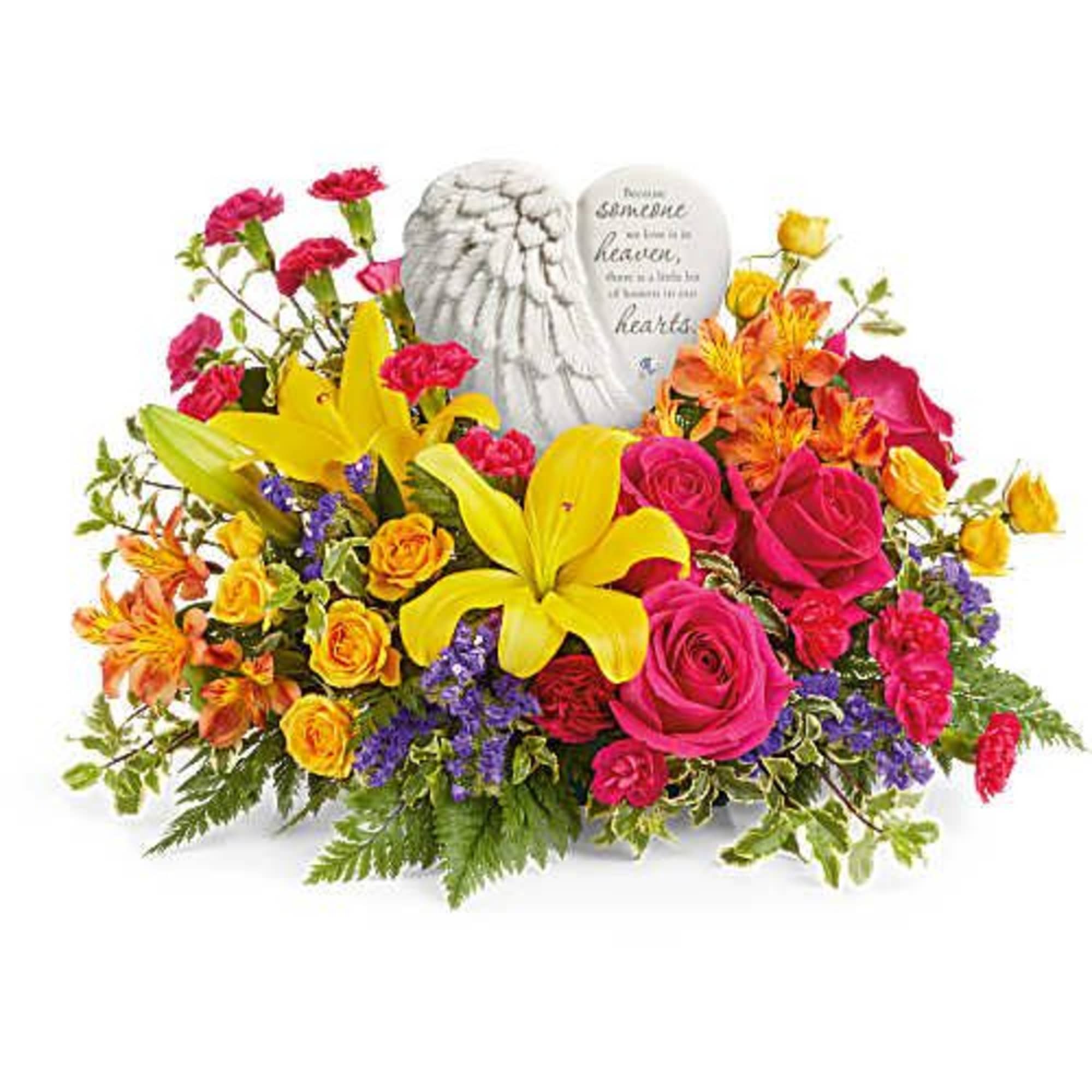 A heartfelt tribute to a cherished life, this stunning arrangement of vibrant