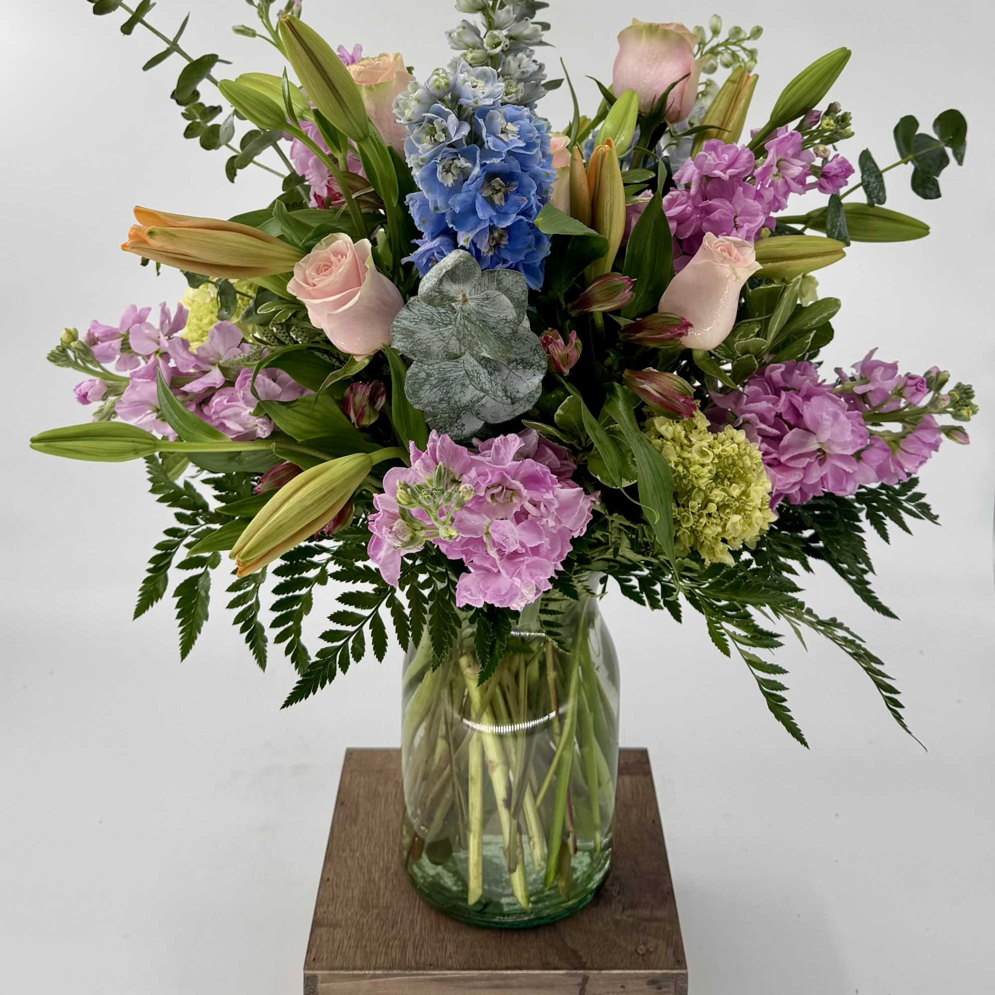Brighten any space with this vibrant flower arrangement featuring blue Delphinium, pink, photo 2 of 4