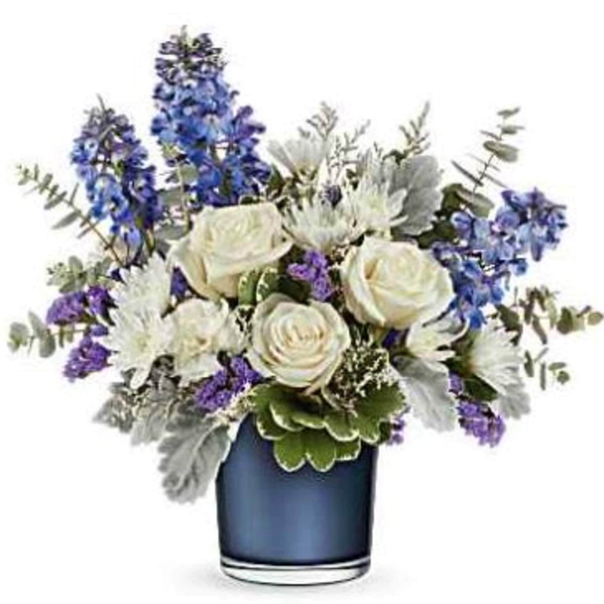 Blue and white flower arrangement in a dark glass vase