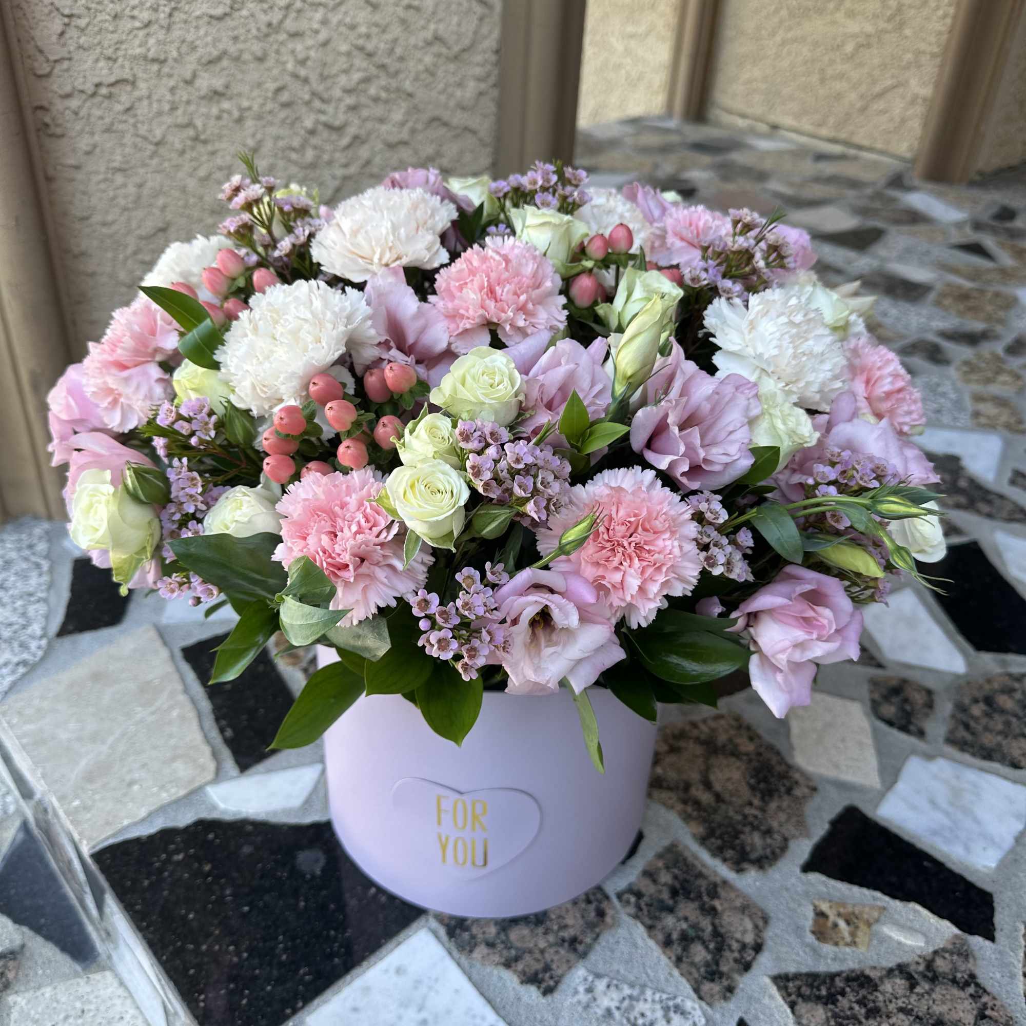 Pink and white mixed bouquet in a lavender hat box
