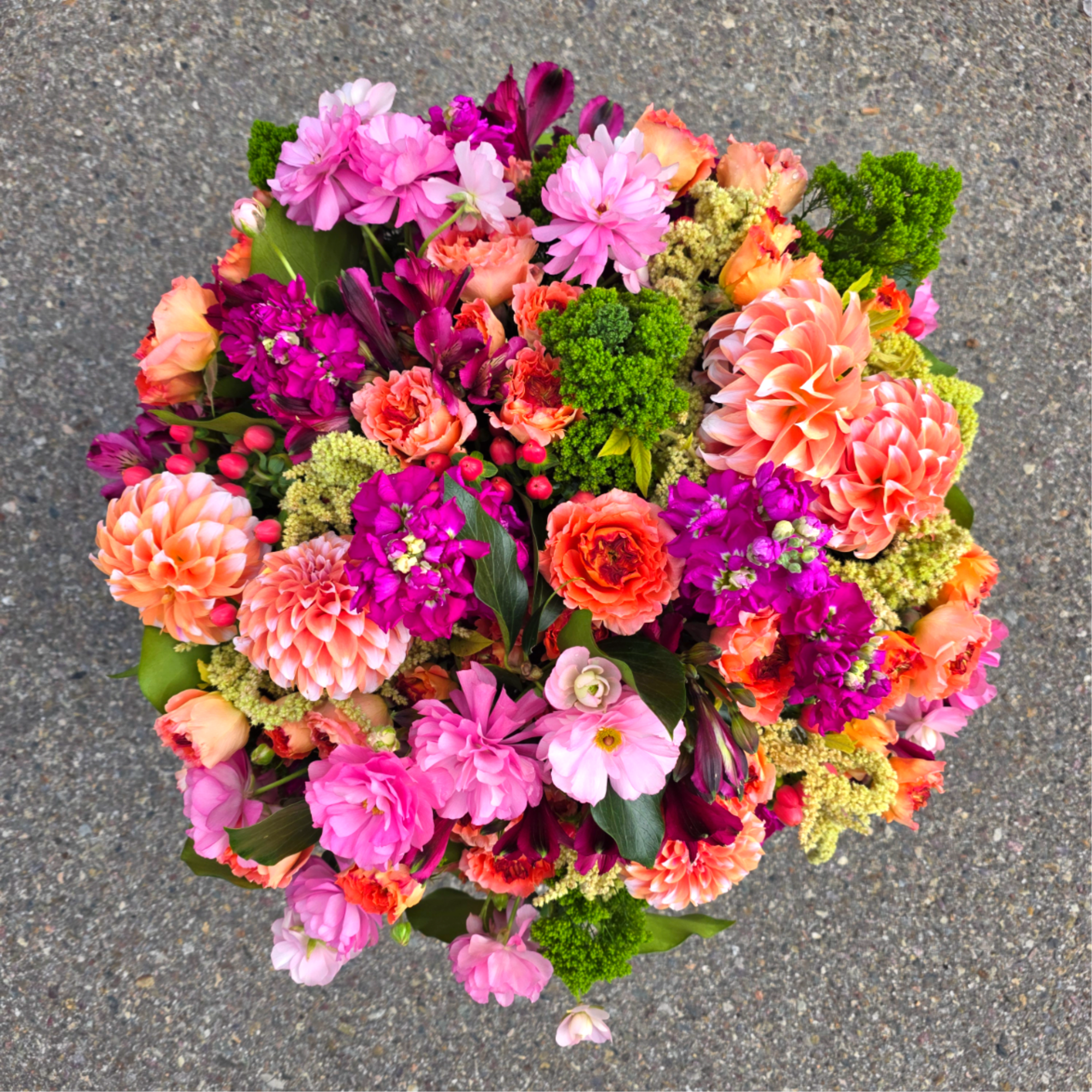 Vibrant + Seductive

A lush flower arrangement bursting with vivid hot pink and