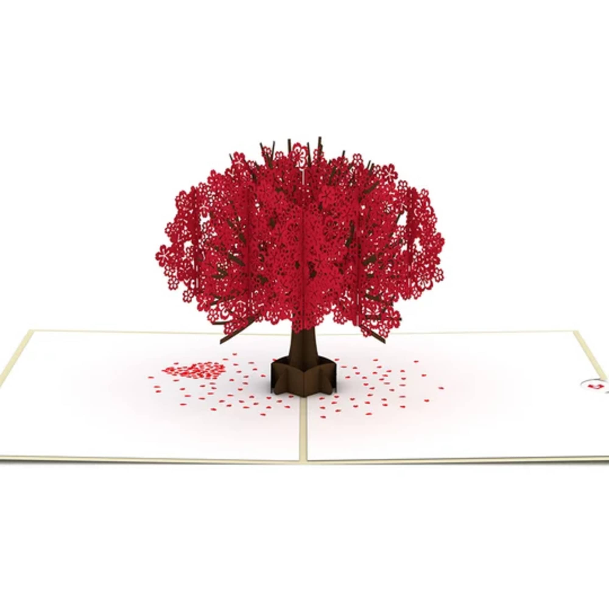 Pop-up card with a red paper tree and scattered petals