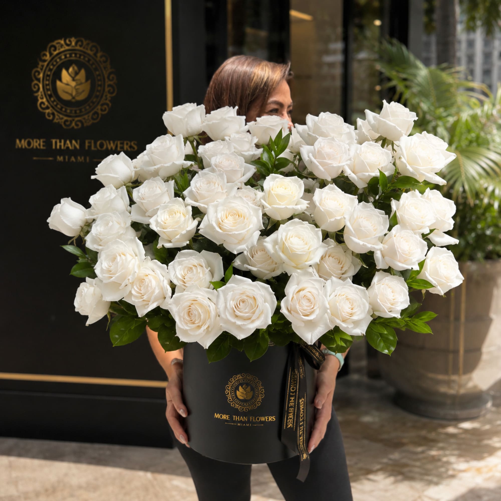 40 reflexed vivid roses cluster arranged in our signature black hatbox with